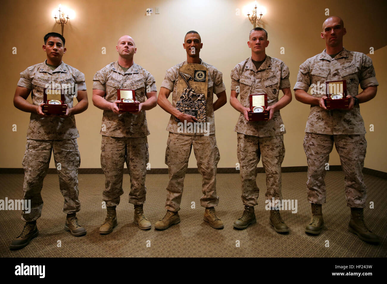 Motor transportation Marines with 1st Marine Division display their 2013 Marine Corps Motor Transportation Association’s awards after an award ceremony aboard Marine Corps Base Camp Pendleton, Calif., April 30, 2014. Four Marines within the division earned individual awards and Truck Company, Headquarters Battalion, 1st Marine Division, earned the 2013 Motor Transportation Unit of the Year award. 1st MarDiv motor transportation unit speeds past competition 140430-M-HQ478-816 Stock Photo