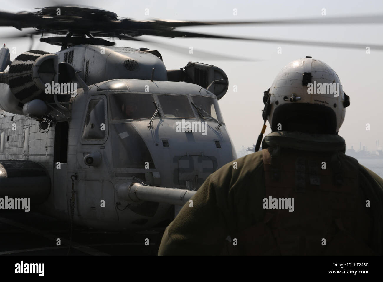 U.S. Marines with Marine Heavy Helicopter Squadron (HMH) 464, Detachment A, 31st Marine Expeditionary Unit, conduct a logistic resupply mission in a CH-53E Super Stallion helicopter from the U.S.S. Sacagawea during exercise Ssang Yong 2014 on April 1, 2014. Exercise Ssang Yong is conducted annually in the Republic of Korea (ROK) to enhance the interoperability of U.S. and ROK forces by performing a full spectrum of amphibious operations while showcasing sea-based power projection in the Pacific. (U.S. Marine Corps Photo by Chief Warrant Officer Clinton Runyon, MCIPAC Combat Camera/Released). S Stock Photo