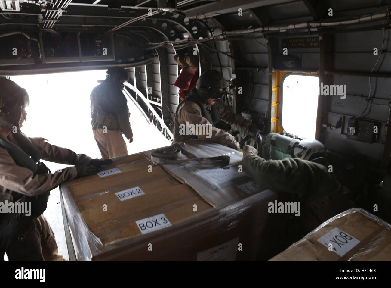 U.S. Marines with Marine Heavy Helicopter Squadron (HMH) 464, Detachment A, 31st Marine Expeditionary Unit, conduct a logistic resupply mission in a CH-53E Super Stallion helicopter from the U.S.S. Sacagawea during exercise Ssang Yong 2014 on April 1, 2014. Exercise Ssang Yong is conducted annually in the Republic of Korea (ROK) to enhance the interoperability of U.S. and ROK forces by performing a full spectrum of amphibious operations while showcasing sea-based power projection in the Pacific. (U.S. Marine Corps Photo by Chief Warrant Officer Clinton Runyon, MCIPAC Combat Camera/Released). S Stock Photo