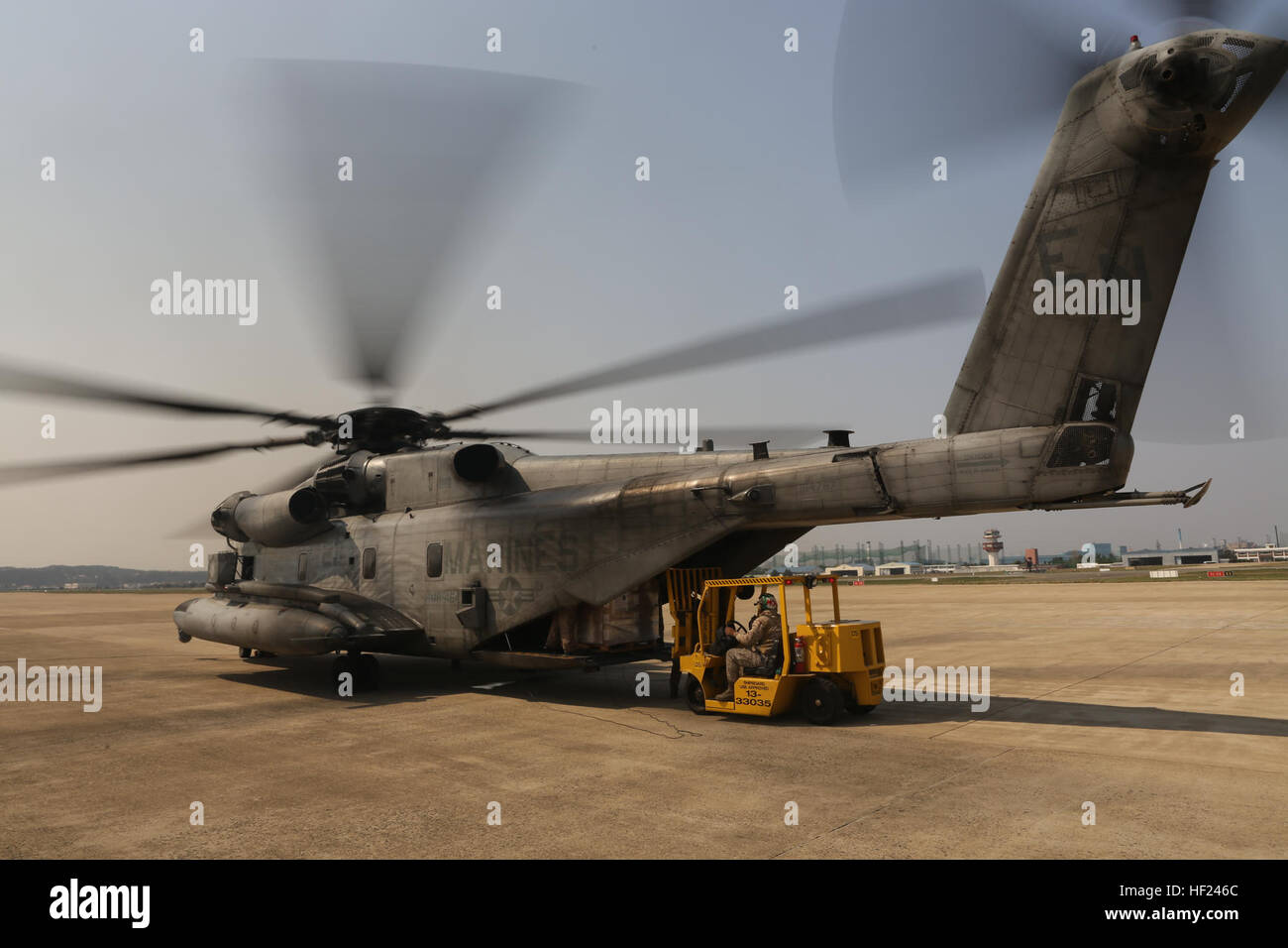 U.S. Marines with Marine Heavy Helicopter Squadron (HMH) 464, Detachment A, 31st Marine Expeditionary Unit, conduct a logistic resupply mission in a CH-53E Super Stallion helicopter from the U.S.S. Sacagawea during exercise Ssang Yong 2014 on April 1, 2014. Exercise Ssang Yong is conducted annually in the Republic of Korea (ROK) to enhance the interoperability of U.S. and ROK forces by performing a full spectrum of amphibious operations while showcasing sea-based power projection in the Pacific. (U.S. Marine Corps Photo by Chief Warrant Officer Clinton Runyon, MCIPAC Combat Camera/Released). S Stock Photo