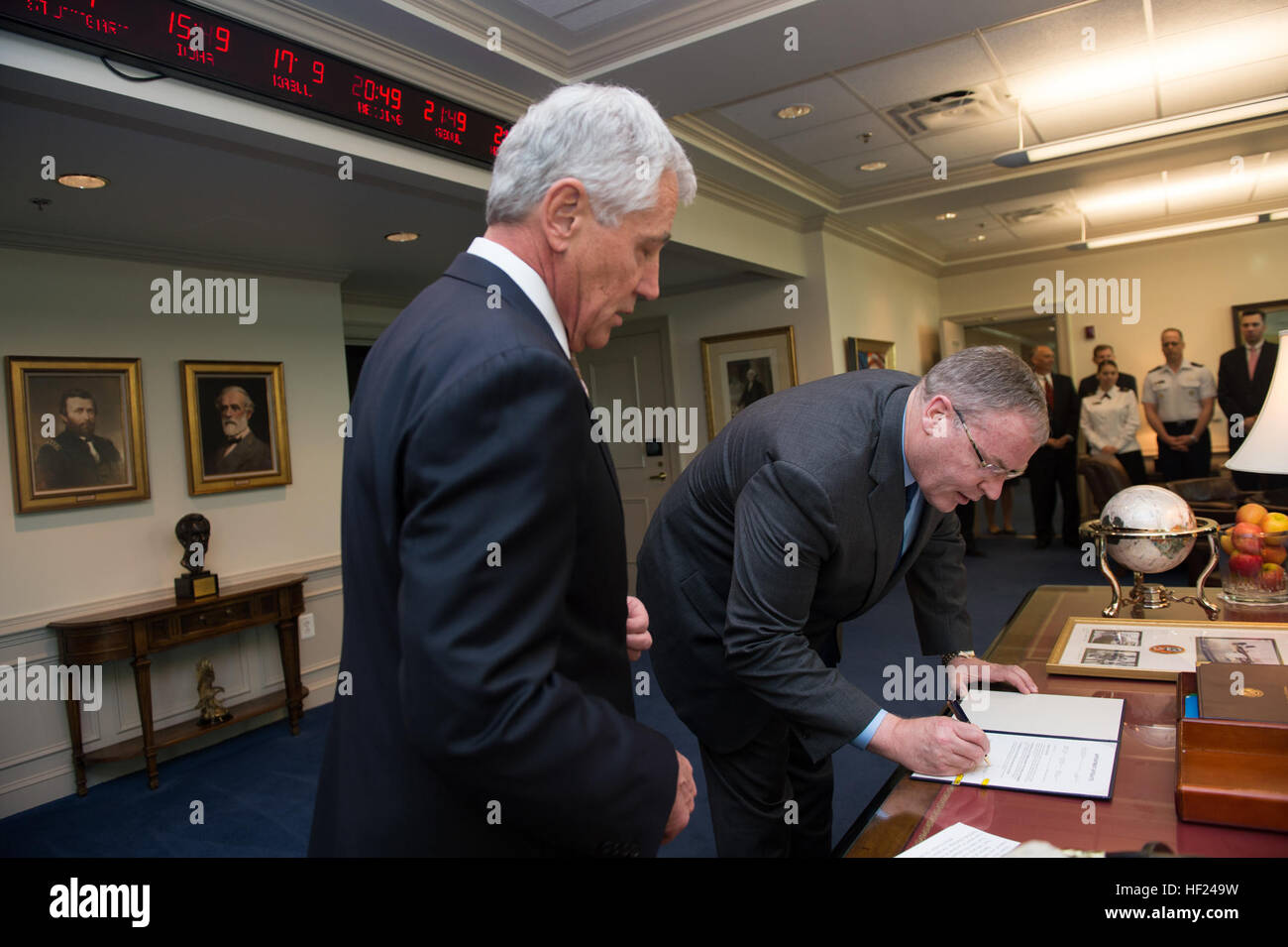 Secretary of Defense Chuck Hagel swears in the new Deputy Secretary of Defense Robert Work at the Pentagon May 5, 2014. Official DoD photo by Sgt. Aaron Hostutler USMC (Released). 140501-M-EV637-016 (14091818766) Stock Photo