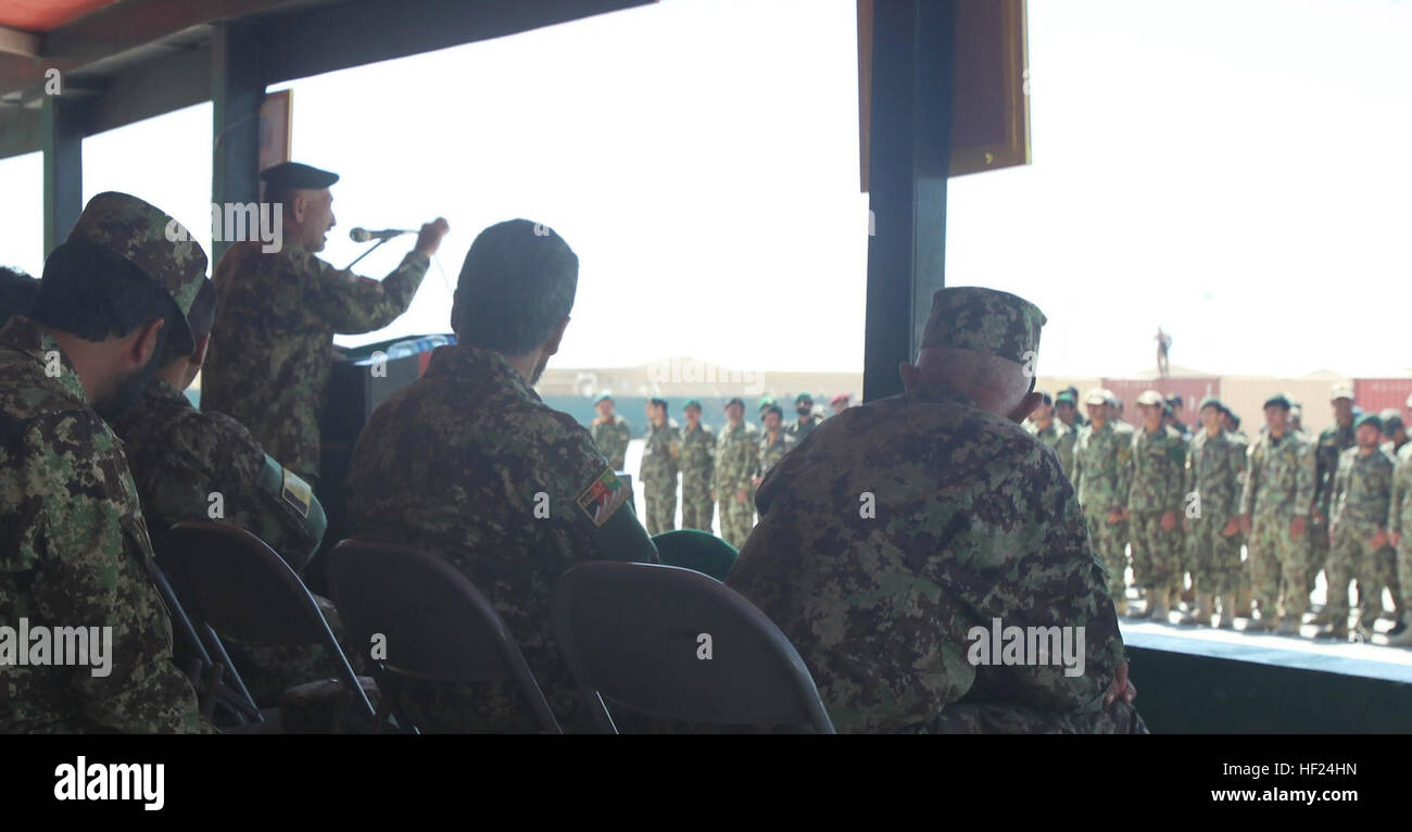 Brigadier Gen. Hassan, chief of staff of the 215th Corps, Afghan National Army, speaks to ANA soldiers during a graduation ceremony for the Regional Corps Battle School instructor course aboard Camp Shorabak, Afghanistan, May 8, 2014. These 20 soldiers began their journey eight months ago. After they completed basic training and advanced rifle and weapons training, they chose to become basic instructors. Upon completion of the basic instructor course, they were selected to go to a three-week advanced instructor course to become “black hat” advanced instructors at RCBS. (U.S. photo by Cpl. Cody Stock Photo