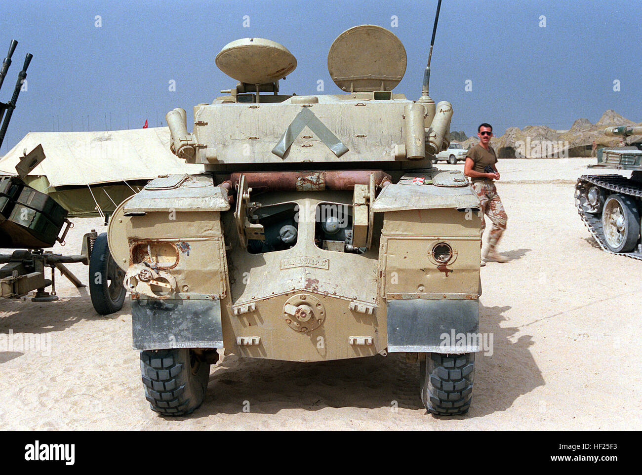 A rear view of an Iraqi AML-90 light armored car that was captured during  Operation Desert Storm. An inverted "V" marking like those used on  coalition vehicles has been placed on the