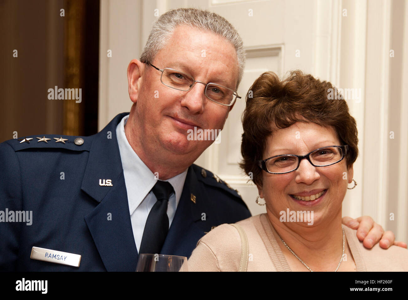 U.S. Air Force Lt. Gen. Mark F. Ramsay, left, poses for a photo during an Evening Parade reception at the Home of the Commandants in Washington, D.C., May 16, 2014. The Evening Parades are held every Friday night during the summer months. (U.S. Marine Corps photo by Cpl. Michael C. Guinto/Released) Evening Parade 140516-M-LI307-144 Stock Photo