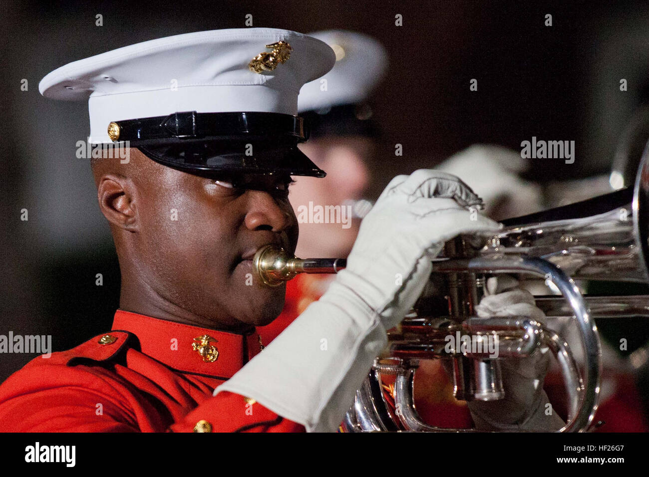 Member of the U.S. Marine Corps Drum and Bugle Corps perform during the Evening Parade at Marine