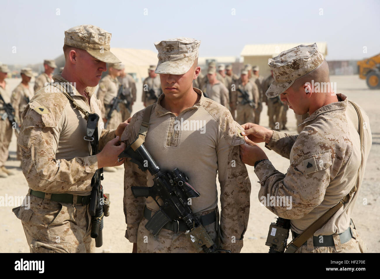 Corporal Jonathan Hollis, a native of Grand Rapids, Michigan, stands at ...