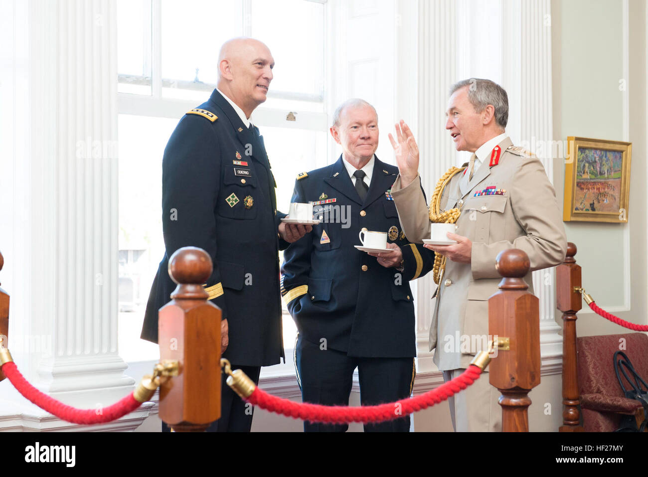 From left, Chief of Staff of the U.S. Army Gen. Raymond T. Odierno, Chairman of the Joint Chiefs of Staff U.S. Army Gen. Martin E. Dempsey and U.K. Chief of Defense Staff for the British Armed Forces Gen. Sir Nicholas Houghton talk after a Guard of Honor ceremony kicking off a Defense Chiefs Strategic Dialog with the U.S. Joint Chiefs of Staff and their U.K. counterparts in London June 10, 2014. (DoD photo by Mass Communication Specialist 1st Class Daniel Hinton, U.S. Navy/Released) US, UK Joint Chiefs of Staff talk collaboration 140610-D-KC128-190 Stock Photo