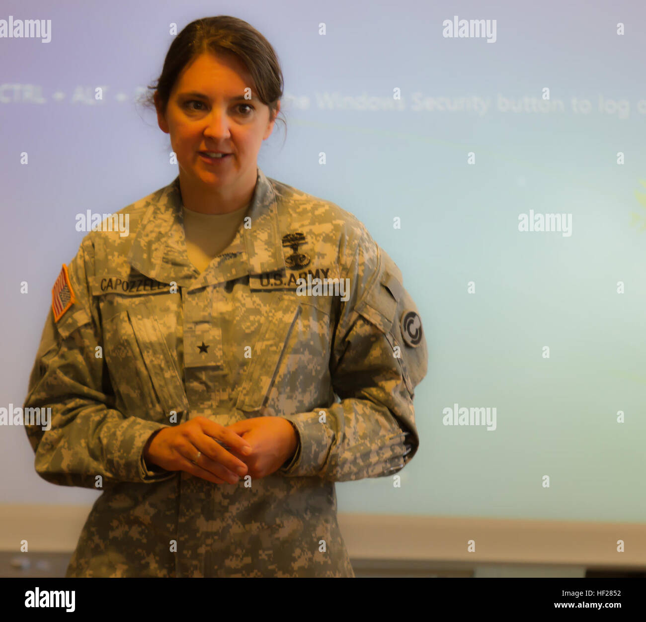 U.S. Army Brig. Gen. Dana M. Capozzella, the assistant adjutant general of the Colorado Army National Guard listens to Soldiers of the 928th Area Support Medical Company during a visit to the Cheyenne River Indian Reservation June 16, 2014, in north central South Dakota. Senior leadership met with Soldiers of the 928th Area Support Medical Company at the Cheyenne River Indian Reservation in north central South Dakota June 16, 2014, while the 928th Area Support Medical Company participated in their Annual Training, from June 7 through June 21, 2014. The 928th ASMC participated in Golden Coyote  Stock Photo