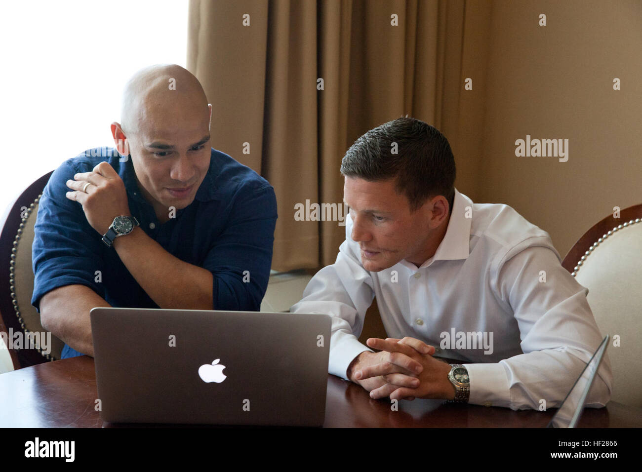 Retired U.S. Marine Corps Cpl. William Kyle Carpenter, right, answers ...