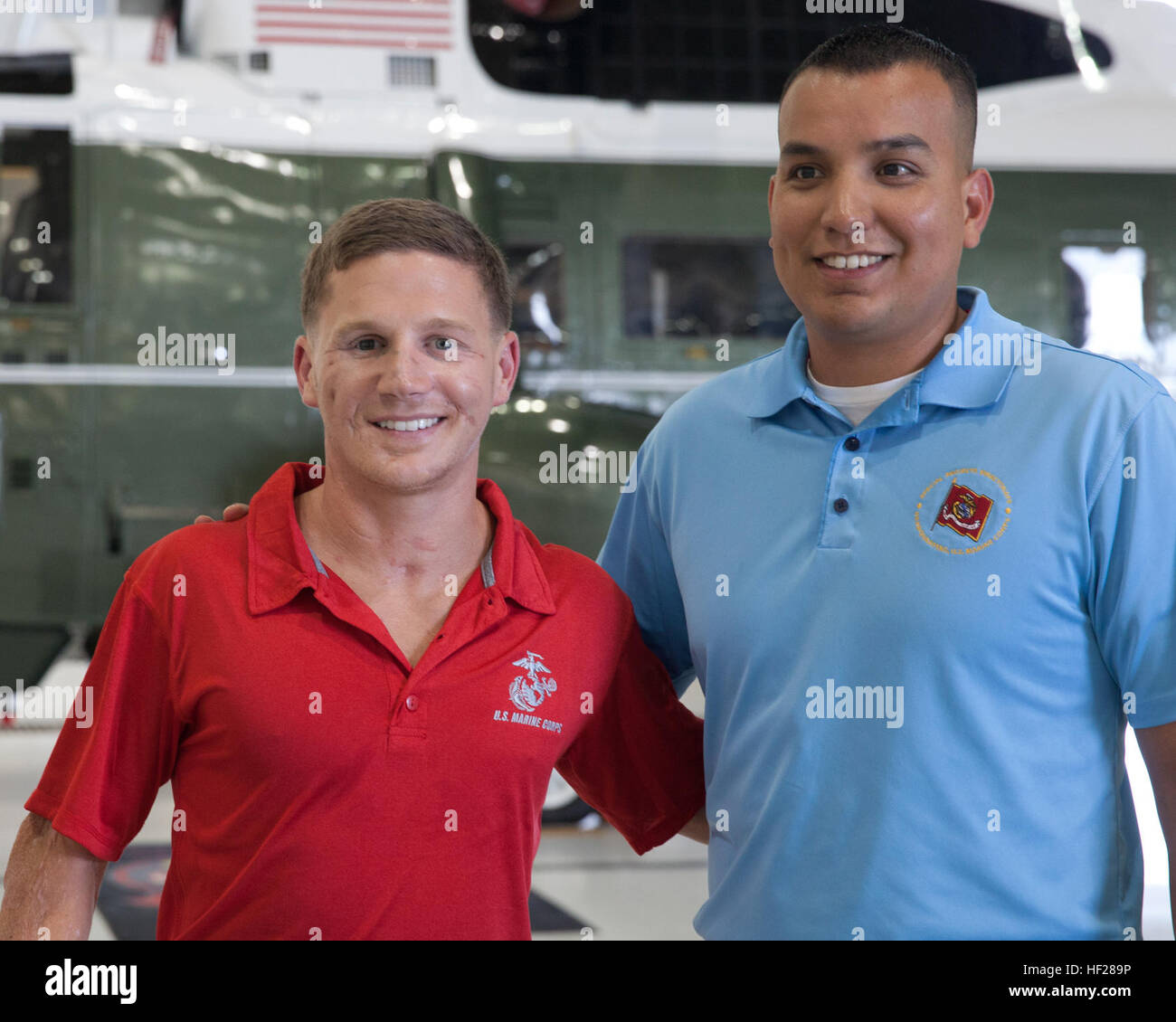 Retired U.S. Marine Corps Cpl. William Kyle Carpenter, left, poses for a photo during a visit to Marine Helicopter Squadron 1 aboard Marine Corps Base Quantico in Quantico, Va., June 17, 2014. Carpenter will receive the Medal of Honor from the President of the United States Barack Obama during a ceremony at the White House on Thursday, June 19, 2014. (U.S. Marine Corps photo by Cpl. Michael C. Guinto/Released) Medal of Honor Kyle Carpenter 140617-M-LI307-120 Stock Photo