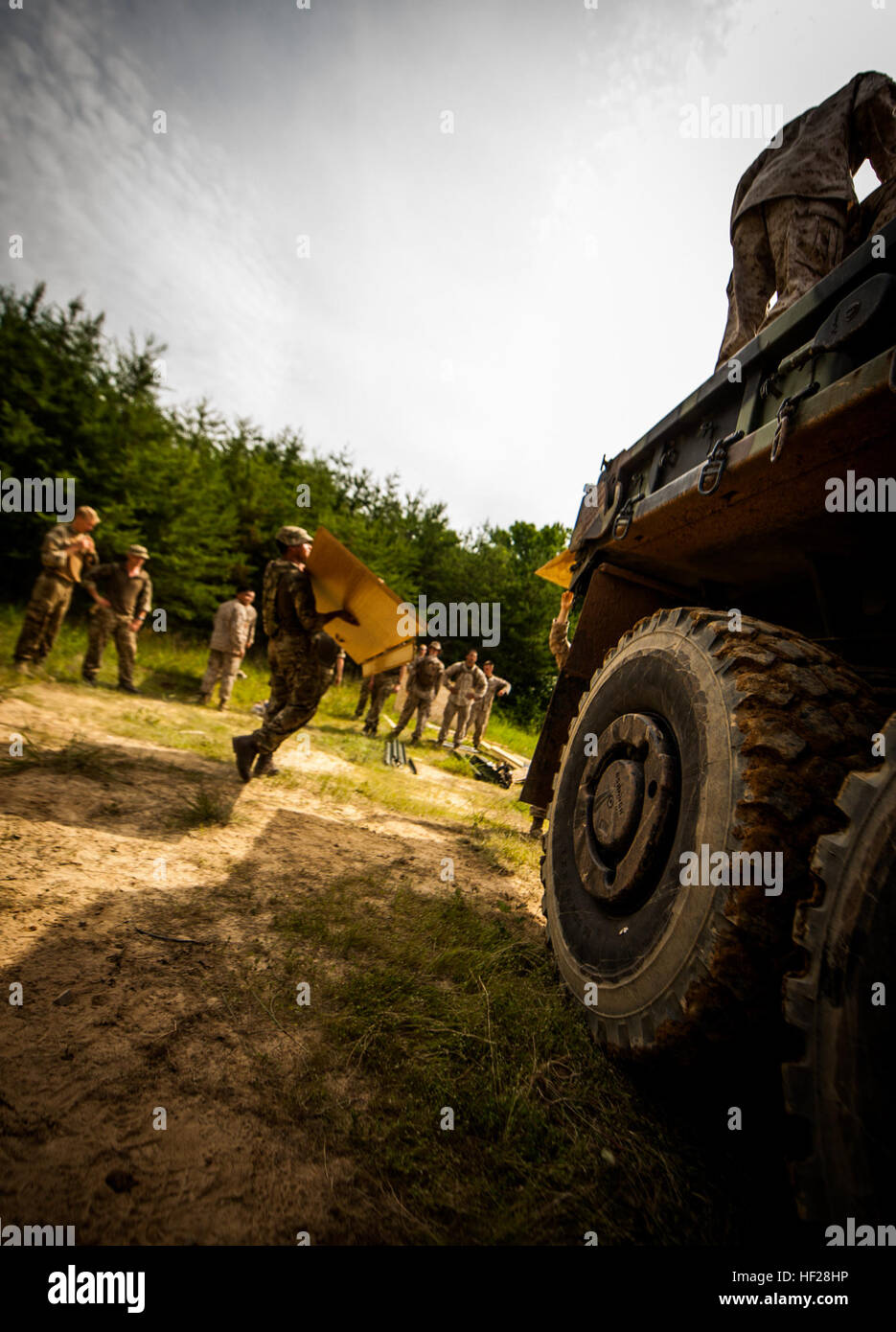 U.S. Marines assigned to the 6th Engineer Support Battalion alongside