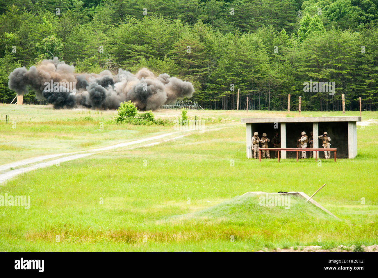 U.S. Marines assigned to the 6th Engineer Support Battalion alongside
