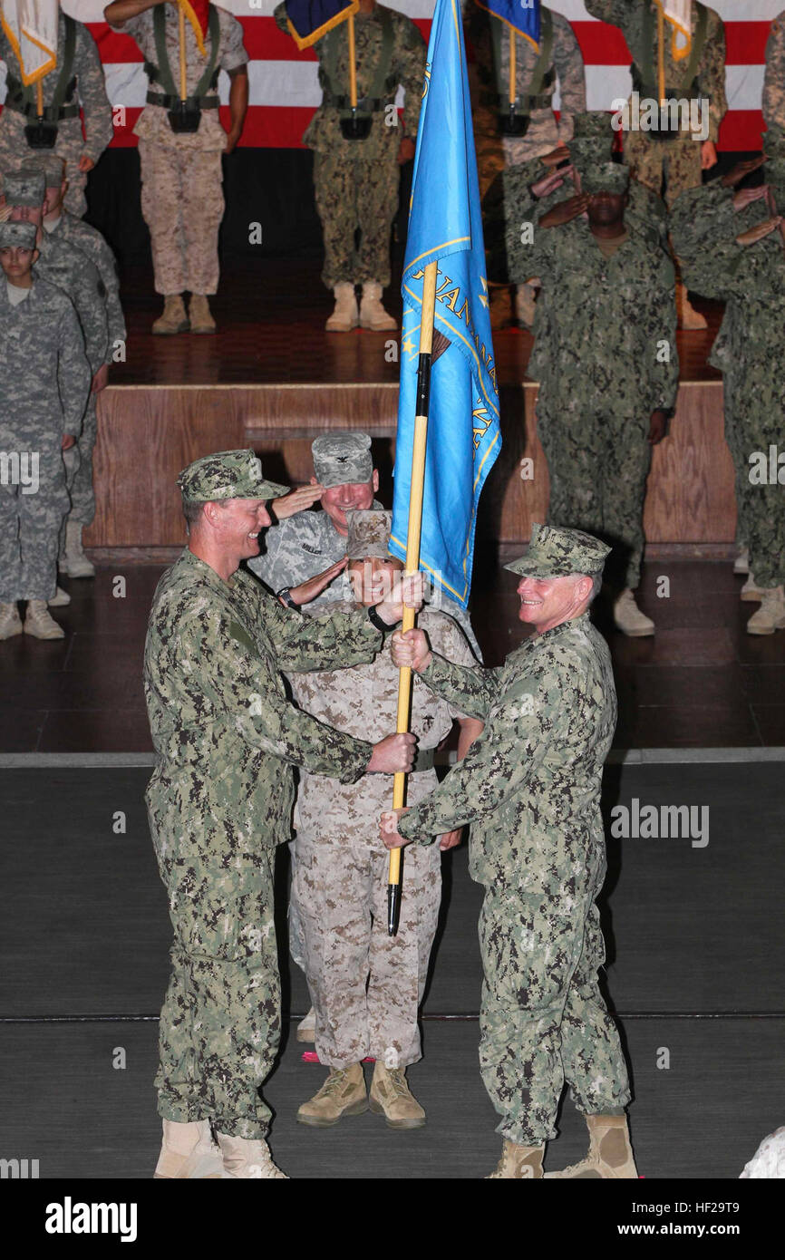 A Joint Task Force conducts a change of command ceremony, transferring ...