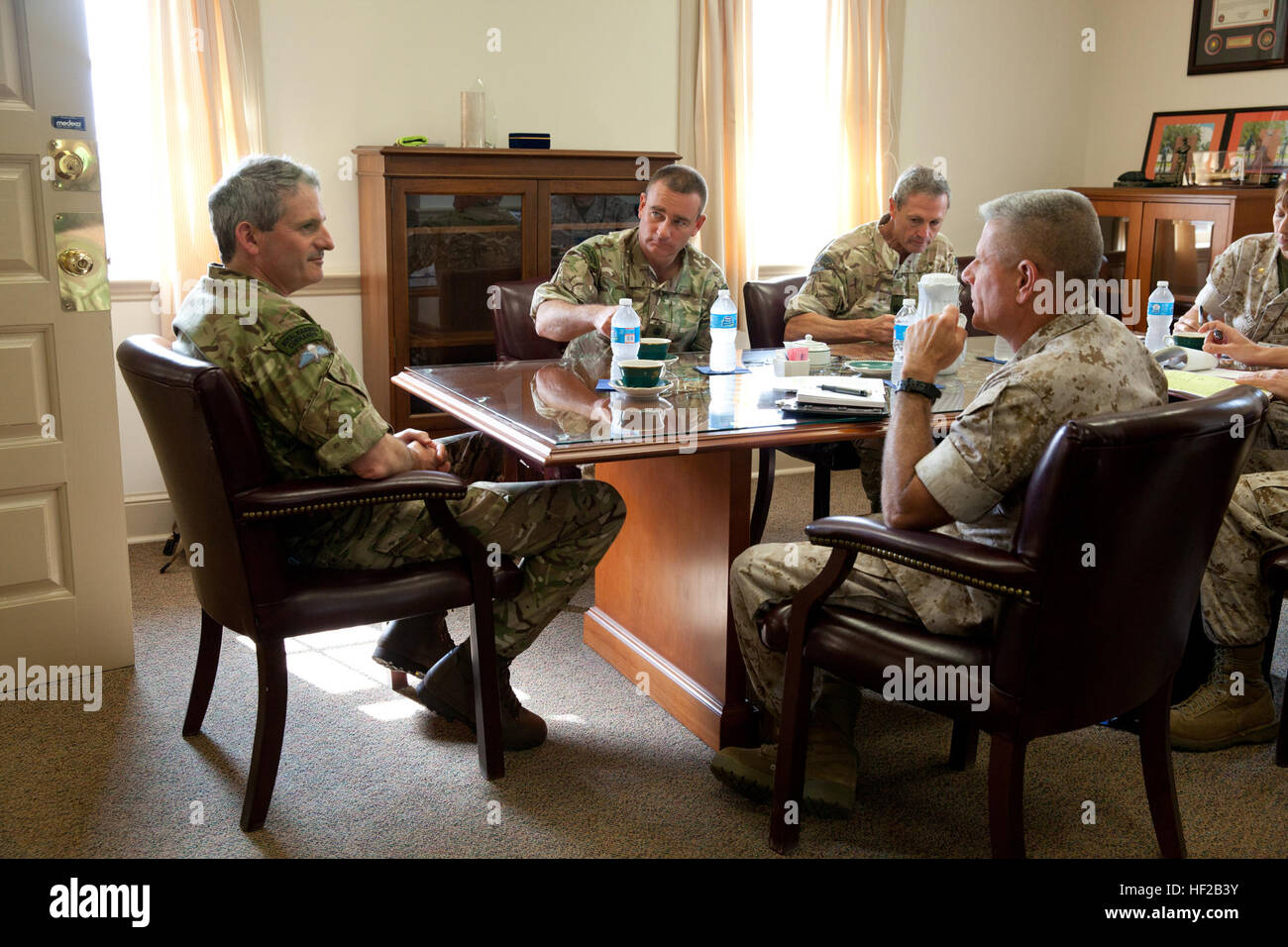 The Commandant General of the British Royal Marines, Maj. Gen. Martin Smith, left, attends a meeting with U.S. and British Marines at Marine Corps Base Quantico, Va., July 22, 2014. Smith is on his first trip to the states since assuming the role of commandant. (U.S. Marine Corps photo by Staff Sgt. Brian Lautenslager, HQMC Combat Camera/Released) British Royal Marines Visit MCB Quantico, Va 140722-M-OH106-199 Stock Photo