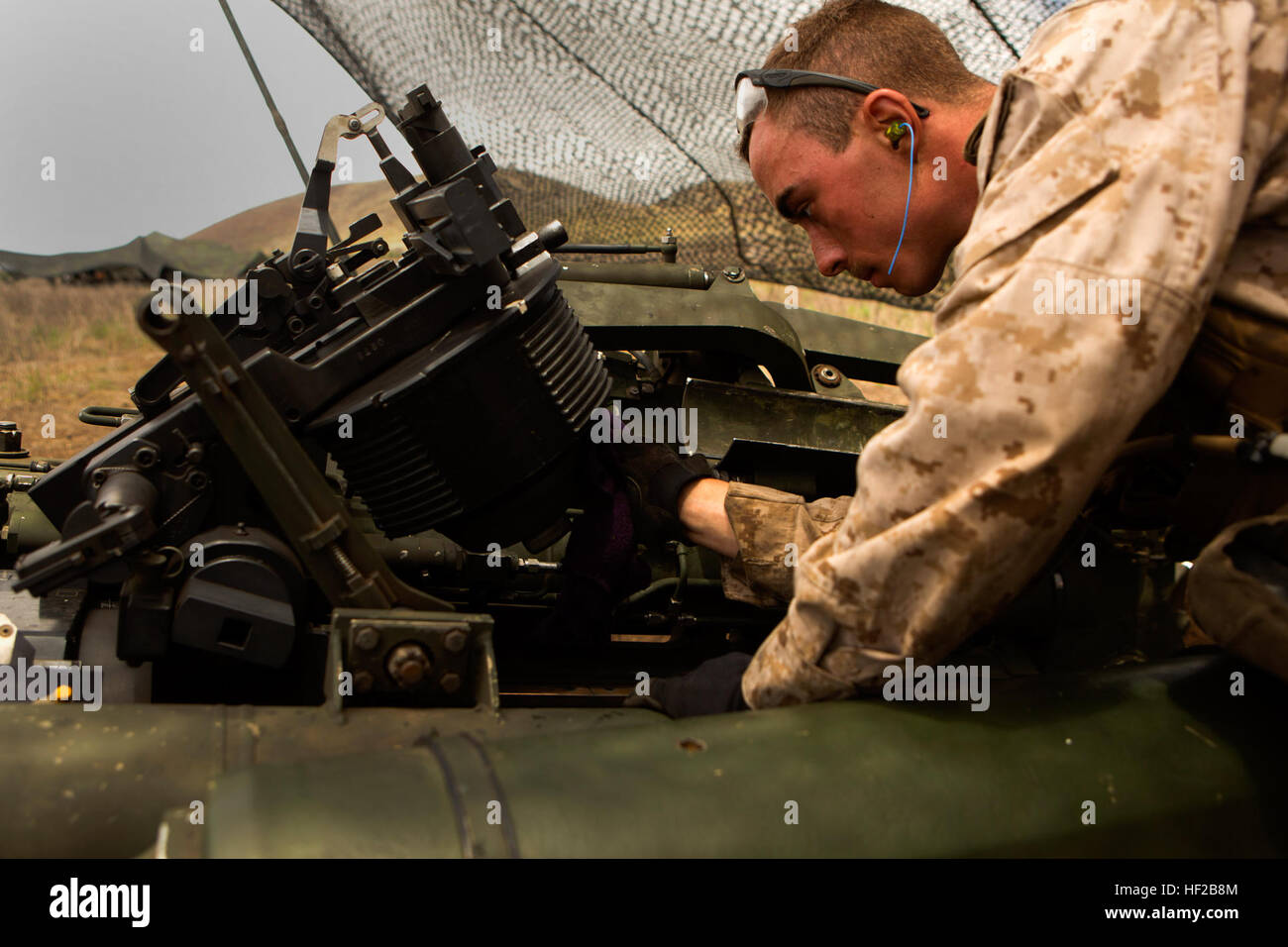U.S. Marine Corps Lance Cpl. Vincent Casada, a field artillery fire controlman, with Charlie