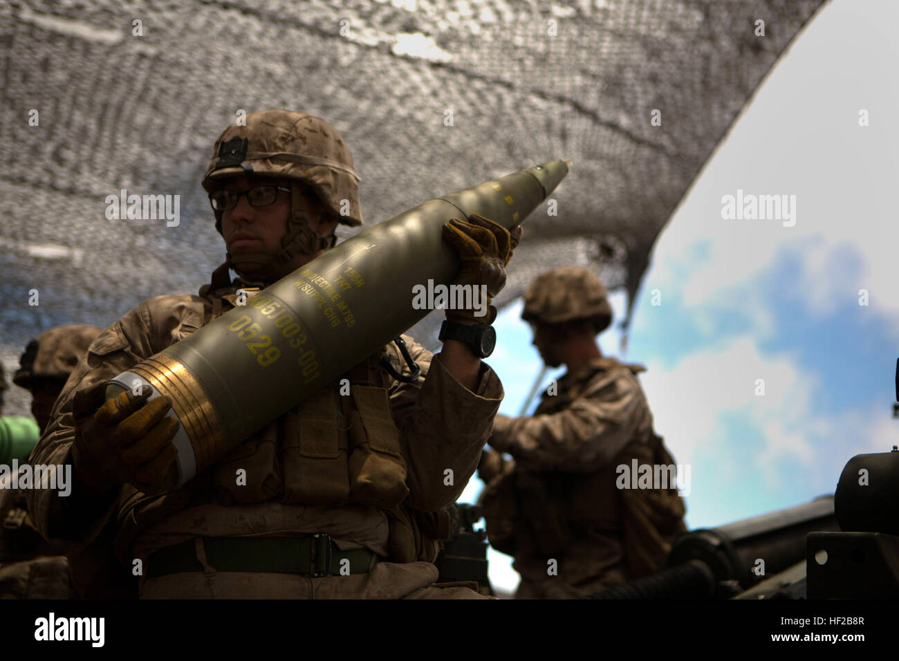 U.S. Marine Corps Lance Cpl. William Melton, a field artillery fire