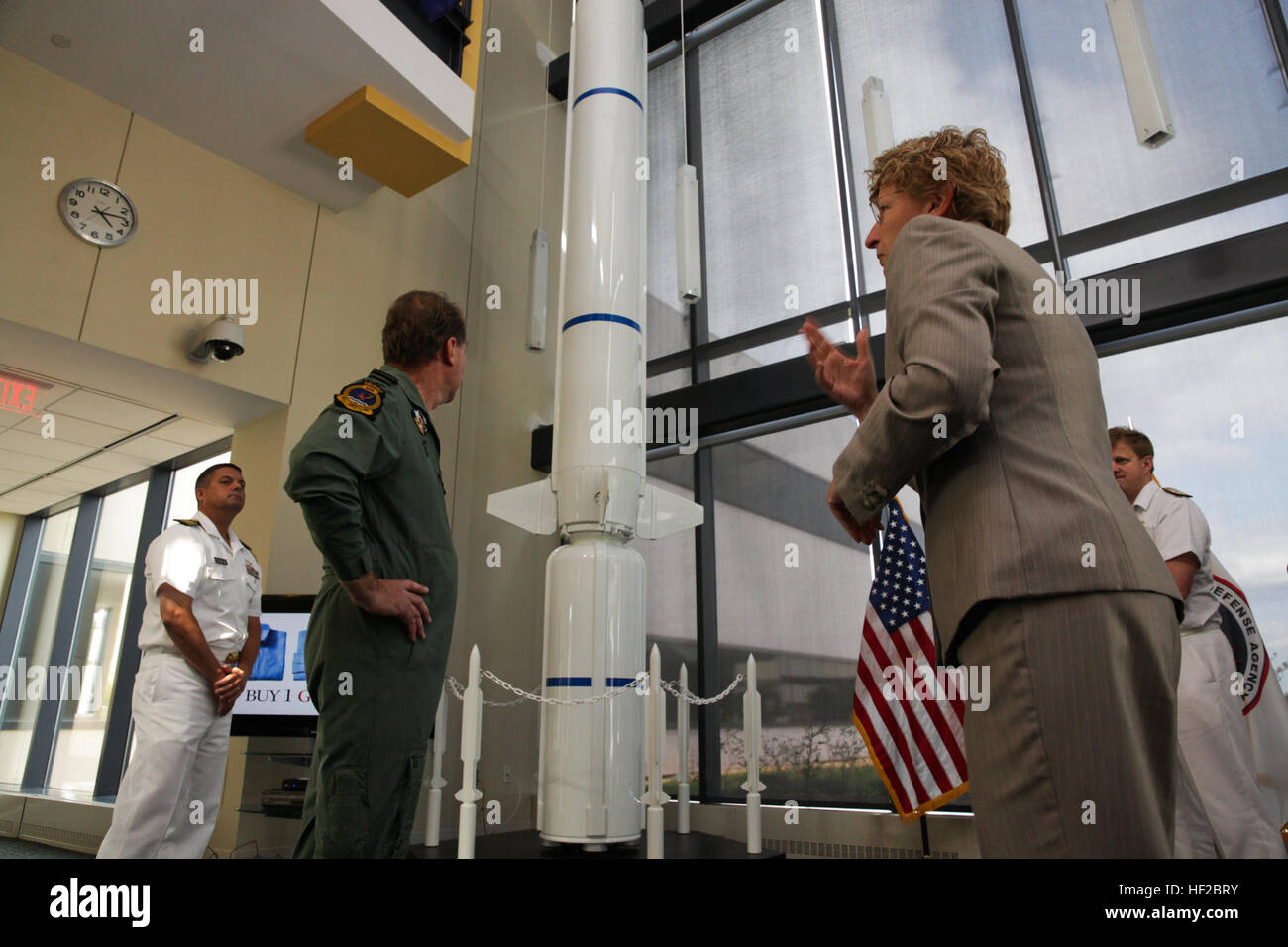 The First Sea Lord and Chief of Naval Staff of the British Royal Navy, Adm. Sir George Zambellas, left, receives a tour of the Missile Defense Agency by Laura DeSimone at Dahlgren, Va., July 29, 2014. Zambellas is taking part in the Commandant of the Marine Corps' Counterpart Program, which invites foreign military leaders to visit the United States and interact with U.S. military leaders. (U.S. Marine Corps photo by Cpl. Michael C. Guinto/Released) First Sea Lord Counterpart Visit 140729-M-LI307-466 Stock Photo