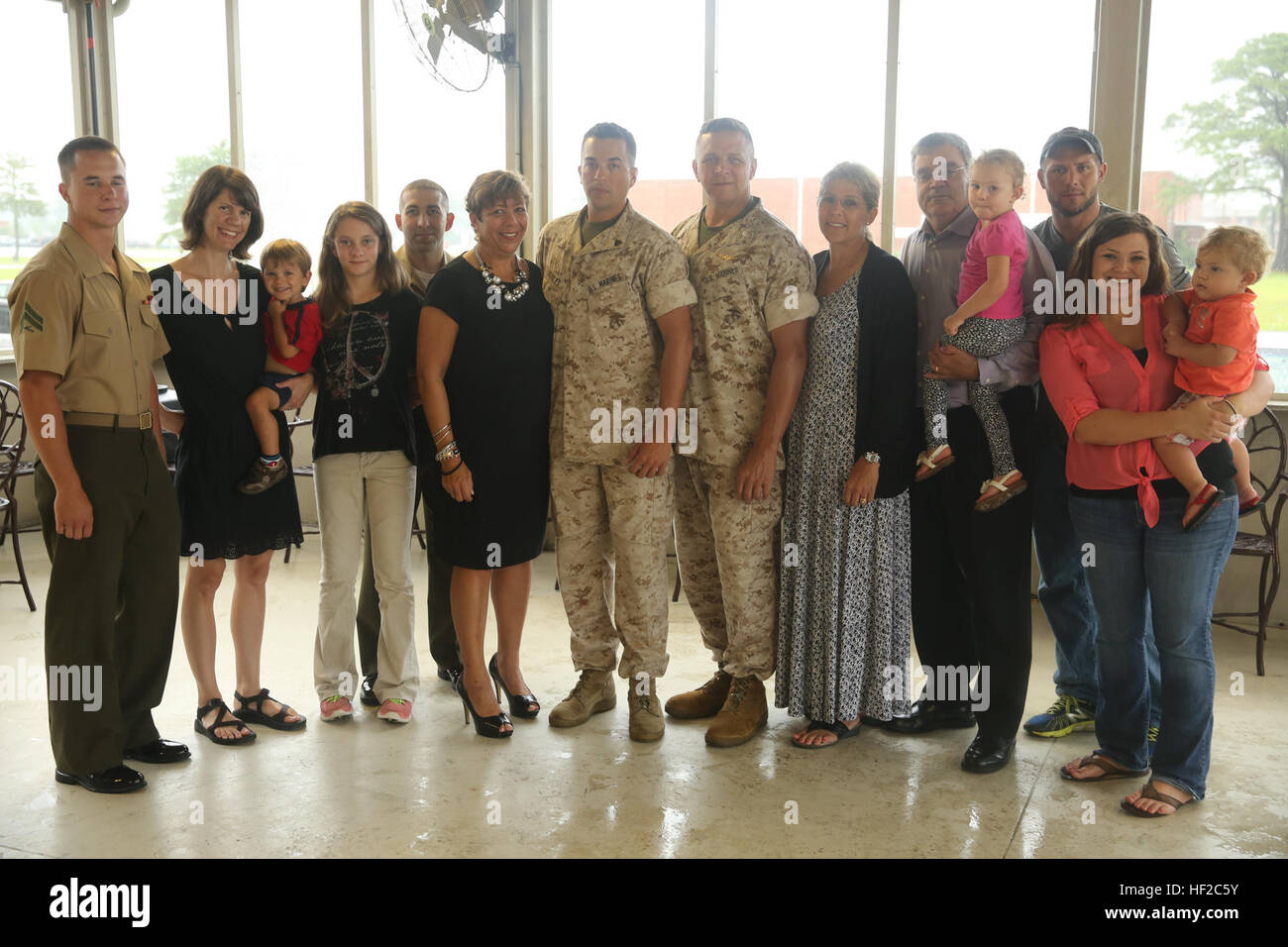 The family of Cpl. Robert Robles gathers for a photo after Robles