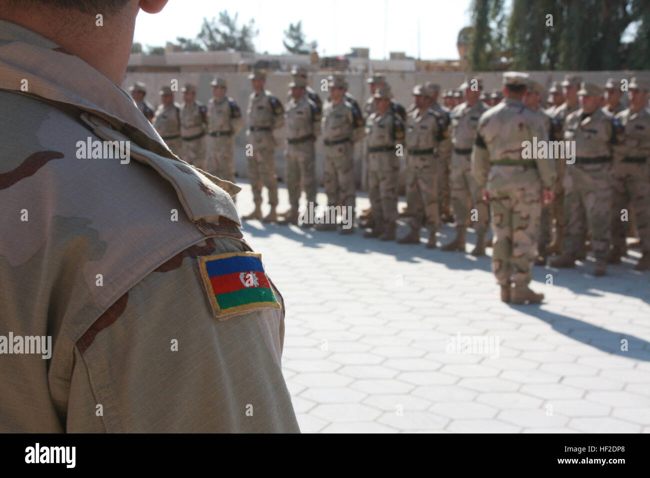 Azerbaijani army soldiers assigned to the 1st Azerbaijani Peacekeeping Company, stand in formation during a ceremony recognizing their contribution to Operation Iraqi Freedom at Camp Ripper, Asad, Iraq, Dec. 3, 2008. The Azerbaijan forces are in the process of leaving after providing security at the Haditha Dam since August of 2003. (U.S. Marine Corps photo by Cpl. Seth Maggard/Released) Azerbaijani soldiers in Iraq 31 Stock Photo