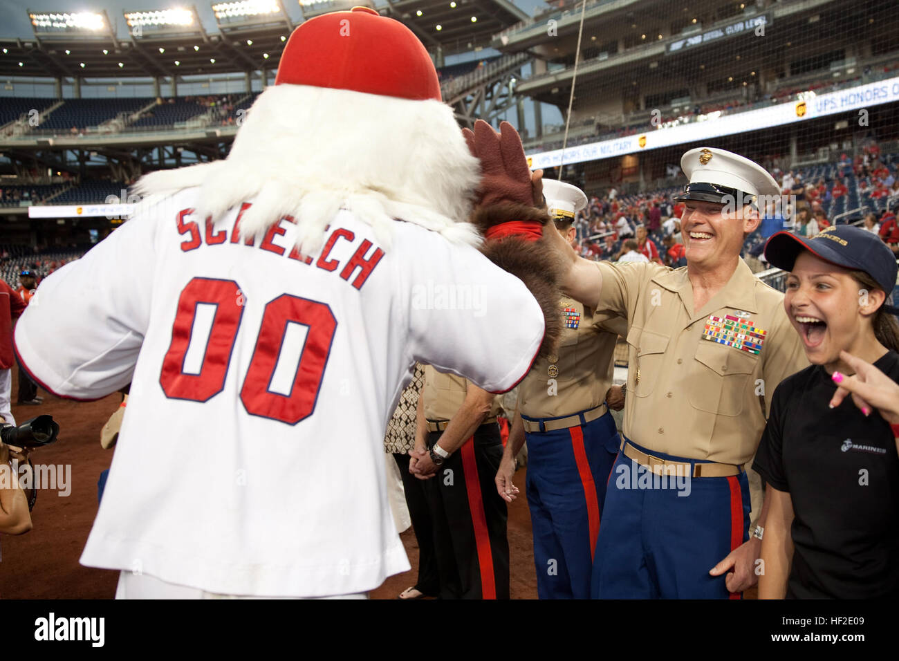 The 17th Sergeant Major of the Marine Corps, Sgt. Maj. Micheal P. Barrett, attends the Washington Nationals' Marines Day baseball game in Washington, D.C., Aug. 20, 2014. (U.S. Marine Corps photo by Lance Cpl. Samantha K. Draughon/Released) Sergeant Major of the Marine Corps Attends Baseball Game 140820-M-EL431-036 Stock Photo