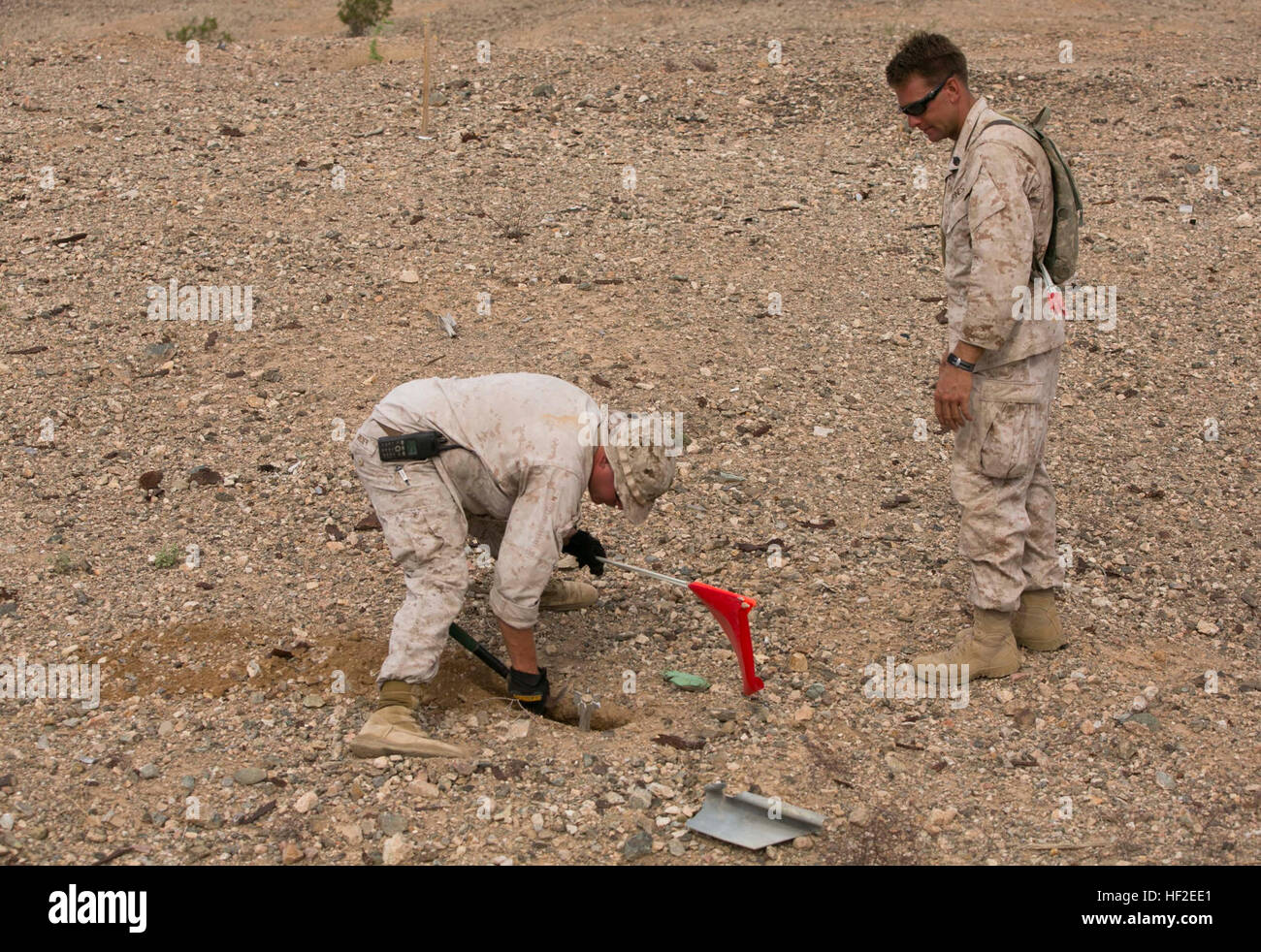 Staff Sgt. Robbie Grieder, left, an Explosive Ordnance Disposal