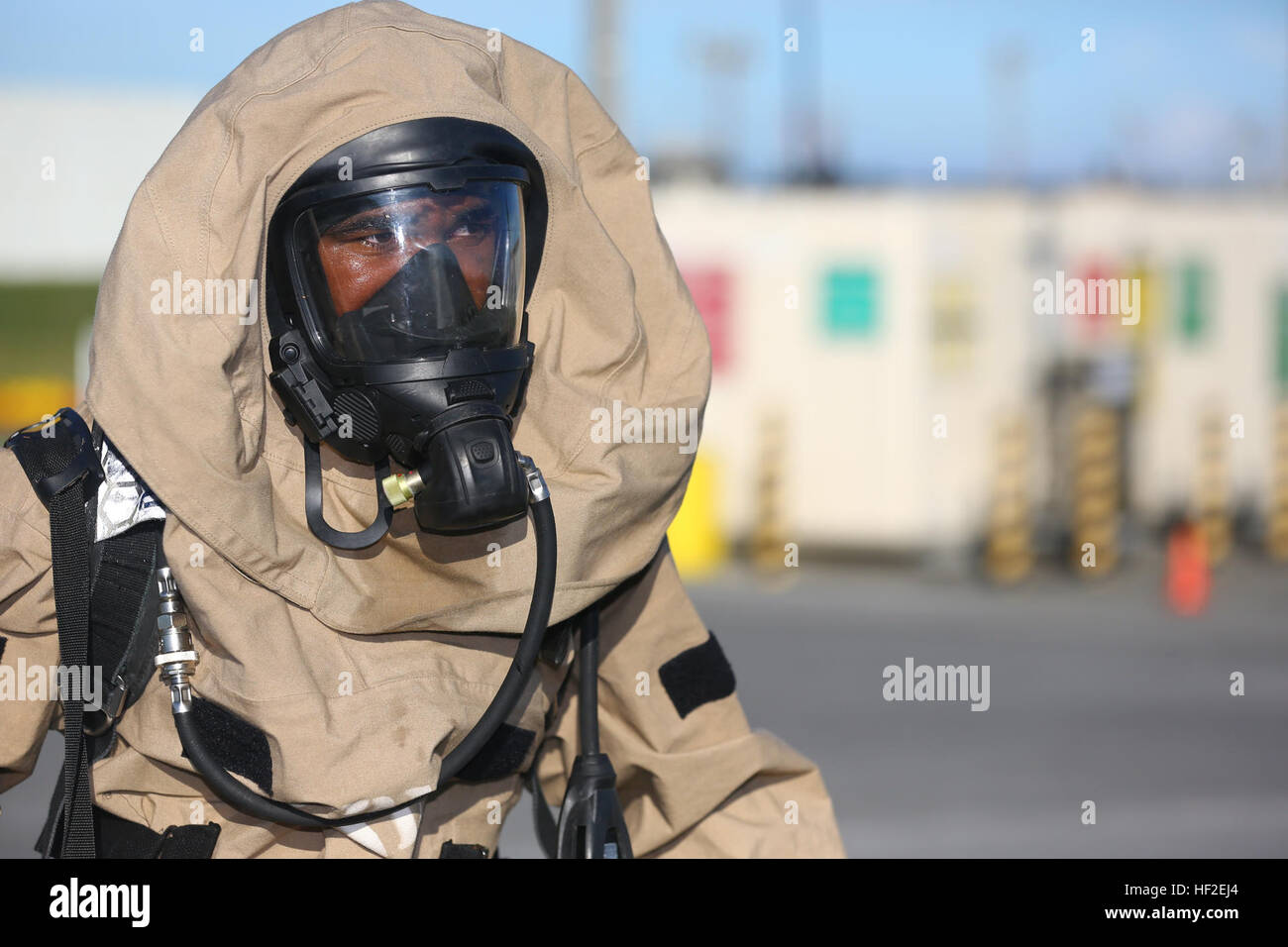 U.S. Marine Corps Lance Cpl. Wendal Albary, with Chemical, Biological, Radiological, and Nuclear Platoon, 1st Marine Aircraft Wing searches for a simulated contaminated site on Marine Corps Air Station Futenma, Okinawa, Japan, Aug. 27, 2014. The training was conducted as part of Ulchi Freedom Guardian 14, a combined military exercise between South Korea and the United States, to help Marines practice casualty evacuation and decontamination of individuals in chemically contaminated environments. (U.S. Marine Corps photo by MCIPAC Combat Camera Lance Cpl. Sergio RamirezRomero/ Released) 1st Mari Stock Photo