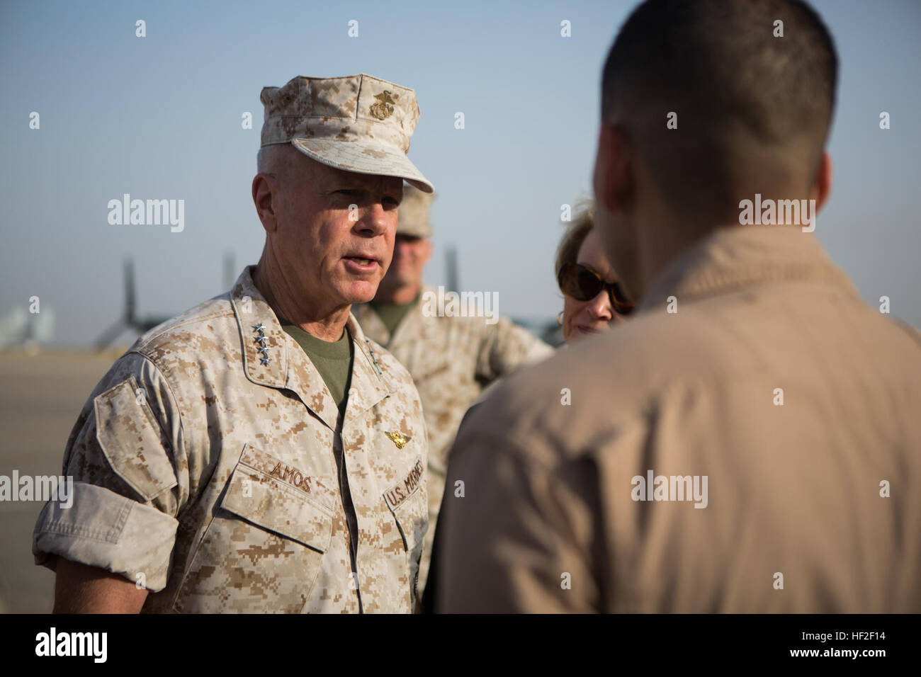 U.S. Marine Corps Gen. James F. Amos, 35th commandant of the Marine Corps, speaks with Lt. Col. Colin J. Brainard, commanding officer of Medium Tiltrotor Squadron 264 (VMM-264), the aviation combat element of Special-Purpose Marine Air Ground Task Force Crisis Response (SP-MAGTF Crisis Response), aboard Morón Air Base, Spain, Sept. 2, 2014. Amos spoke to the Marines and Sailors about the significance of SP-MAGTF Crisis Response. SP-MAGTF Crisis Response is a rotational force of Marines and Sailors that give U.S. Africa Command the ability to rapidly respond to a broad range of military operati Stock Photo