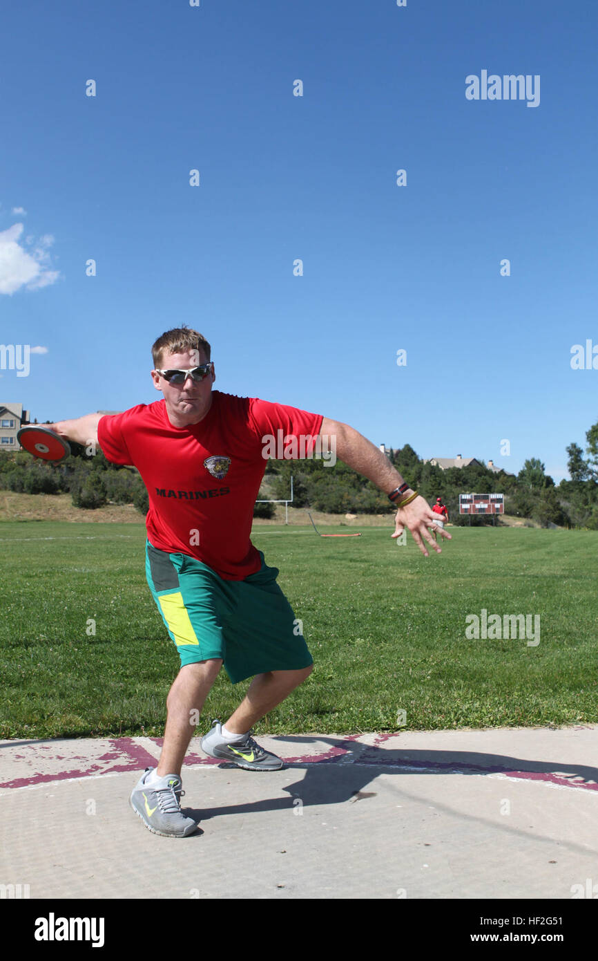 A Marine practices discus during field training in preparation for the ...