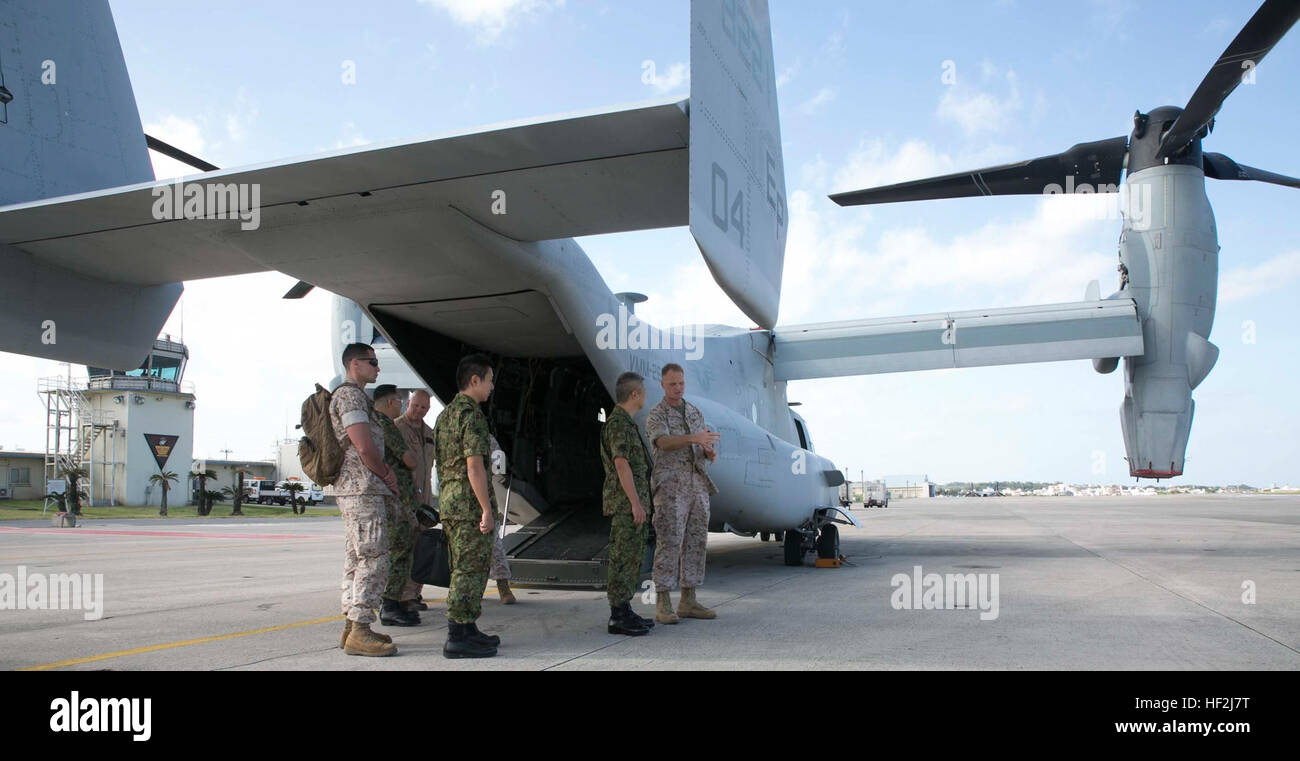 U.S. Marine Brig. Gen. Steven R. Rudder, right, speaks with Japan ...