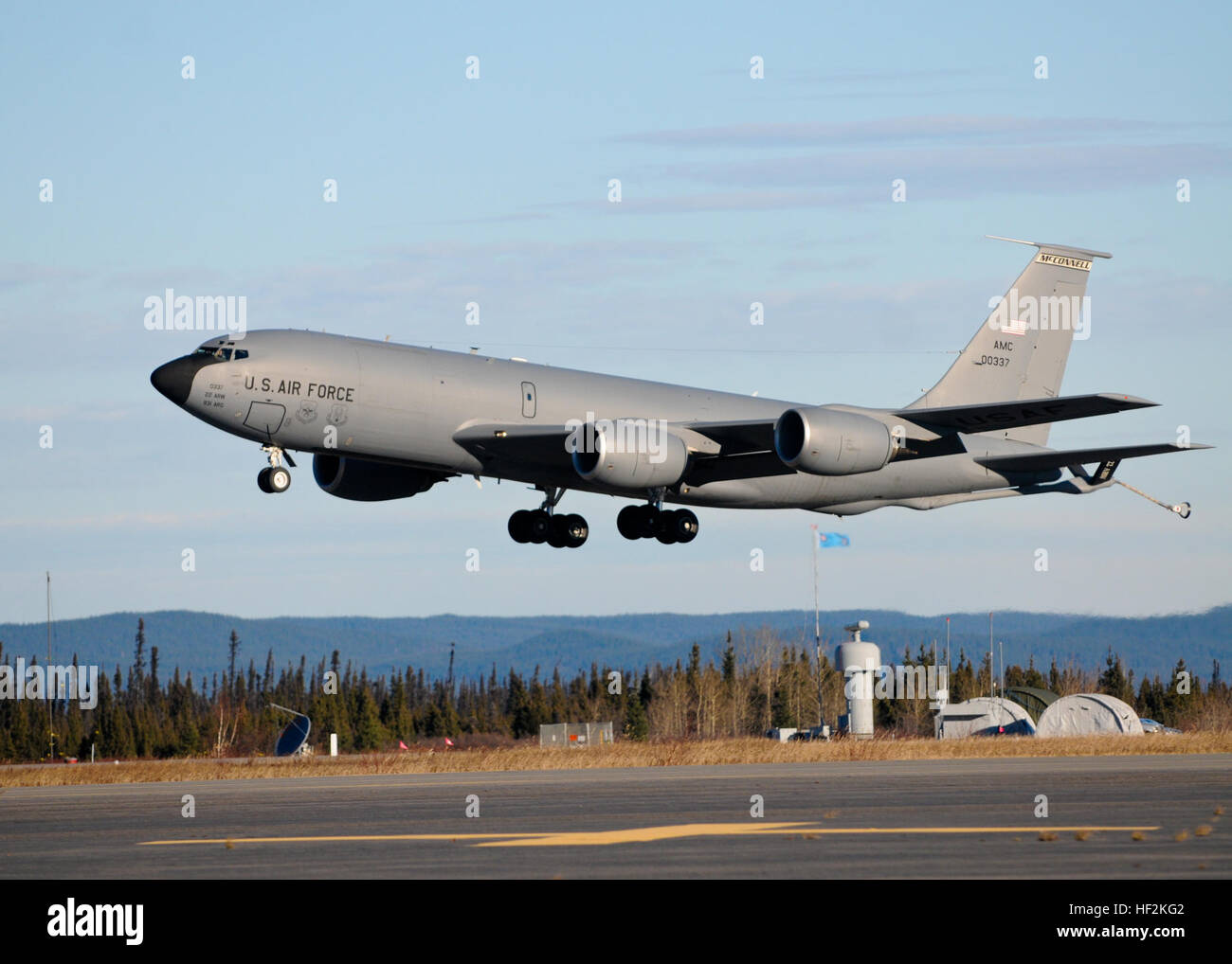 A KC-135 Stratotanker from 22nd Air Refueling Wing, lifts off from 5 Wing Goose Bay, Newfoundland and Labrador, Canada, during exercise Vigilant Shield 15, Oct. 23, 2014. The Vigilant Shield field training exercise is a bi-national NORAD Command exercise which provides realistic training and practice for American and Canadian forces in support of respective national strategy for North America’s defense. NORAD ensures U.S. and Canadian air sovereignty through a network of alert fighters, tankers, airborne early warning aircraft, and ground-based air defense assets cued by interagency and defens Stock Photo