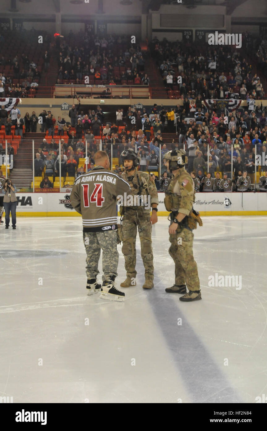 Alaska Air National Guard Pararescue Jumpers From The 212th Rescue Squadron Repel From The Rafters To Deliver The Puck To Maj Gen Michael Shields Commanding General Of U S Army Alaska Before The Alaska Air National Guard Pararescue Jumpers From The 212th Rescue Squadron Repel From The Rafters To Deliver The Puck To Maj Gen Michael Shields Commanding General Of U S Army Alaska Before The
