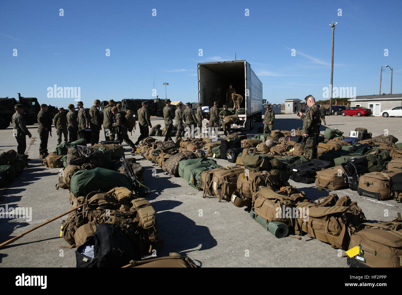 Marines with the 24th Marine Expeditionary Unit stage equipment and
