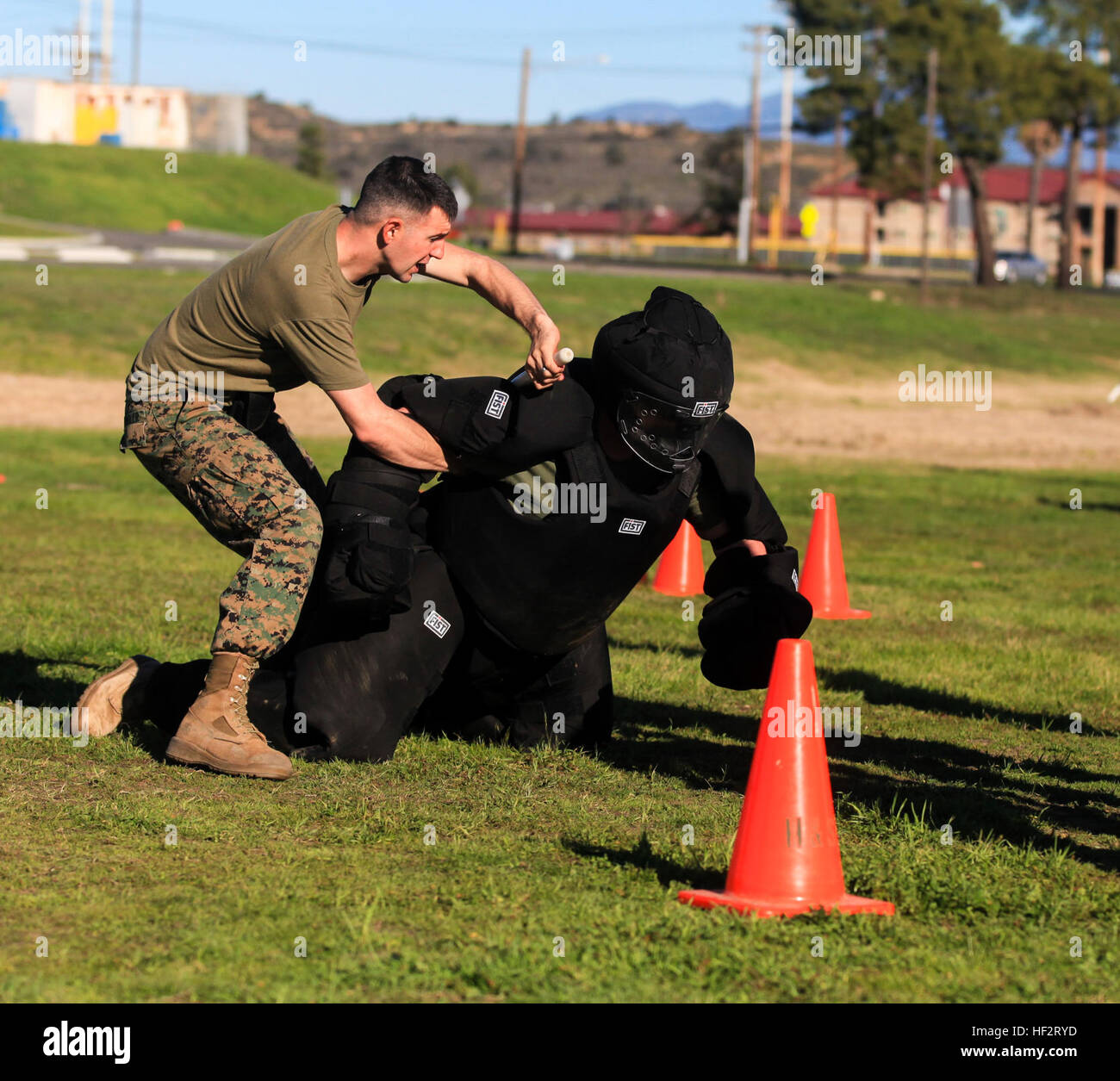 A Marine with 1st Law Enforcement Battalion negotiates a fight station