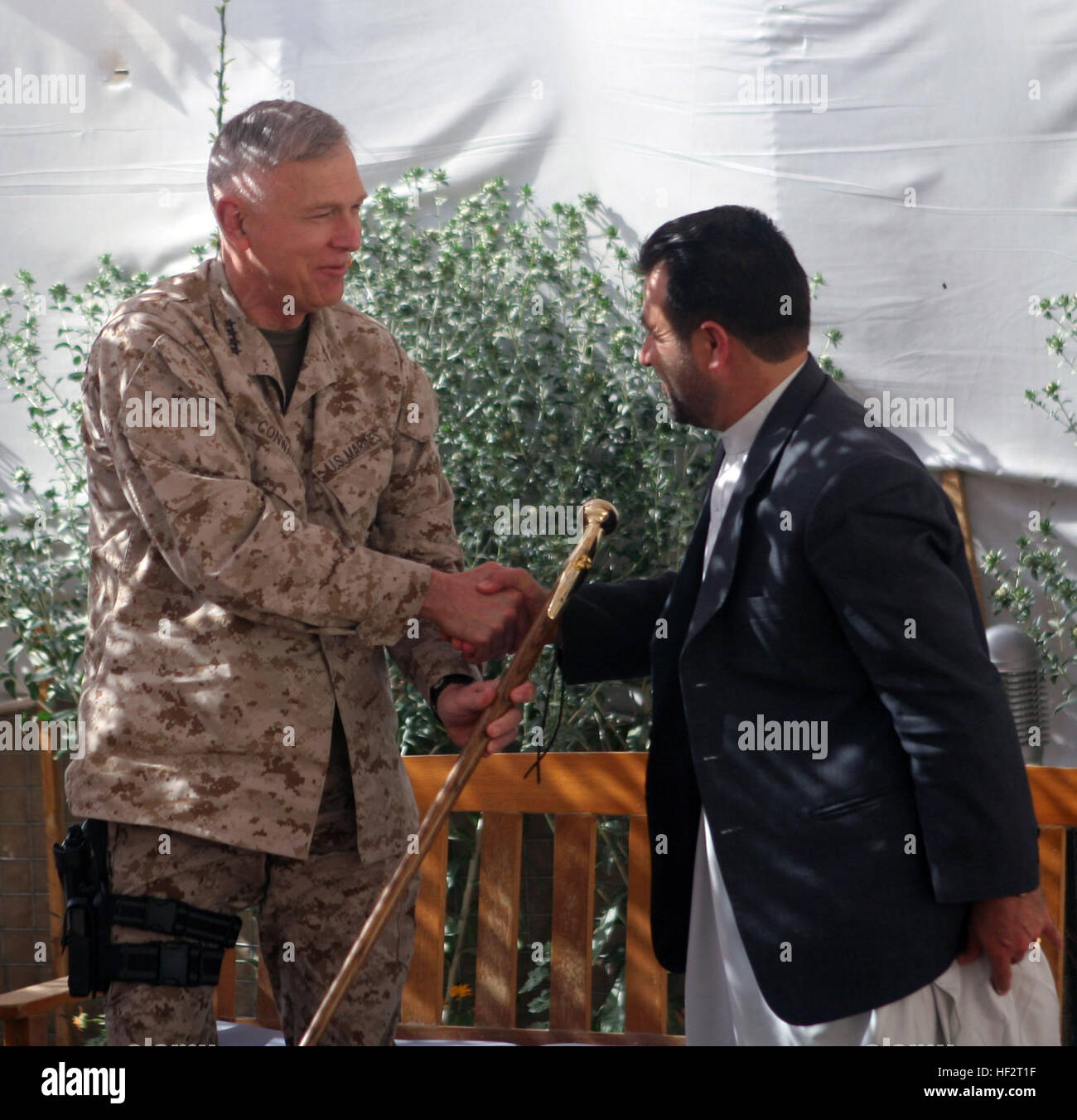 Gen. James T. Conway presents an authentic Marine Corps walking stick