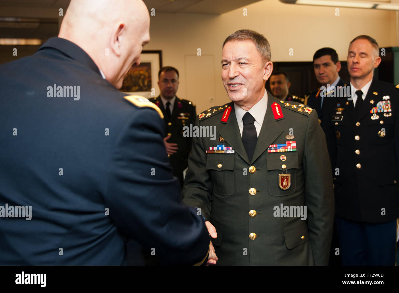 U.S. Army Chief of Staff Gen. Ray Odierno greets Gen. Hulusi Akar, Turkish Land Forces commander before conducting an office call at the Pentagon, Arlington, Va., Jan. 27, 2015. (U.S. Army photo by Staff Sgt. Mikki L. Sprenkle/Released) Gen. Hulusi Akar, Turkish Land Forces commander visits with US Army Chief of Staff Stock Photo