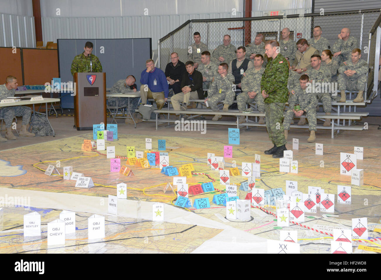 Joint force participants of the 38th Infantry Division 2015 Warfighter Exercise provide strategy briefings to 38th ID Commander Maj. Gen. Wood during a combined arms rehearsal at Atterbury-Muscatatuck, Ind. 38th Infantry Division Warfighter Combined Arms Rehearsal 150201-Z-RL822-013 Stock Photo