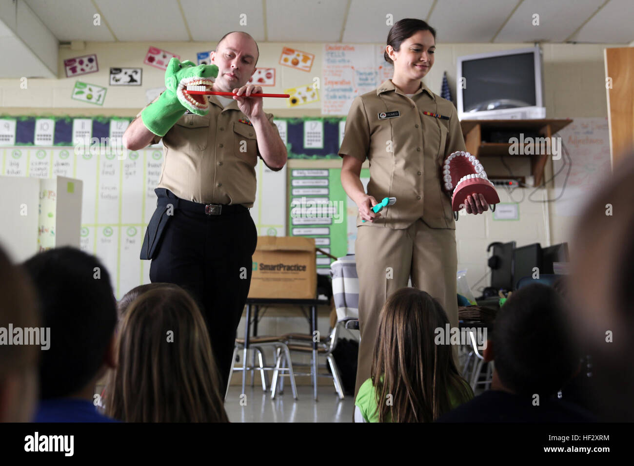 Petty officer 2nd class Patrick Krebs demonstrates proper teeth