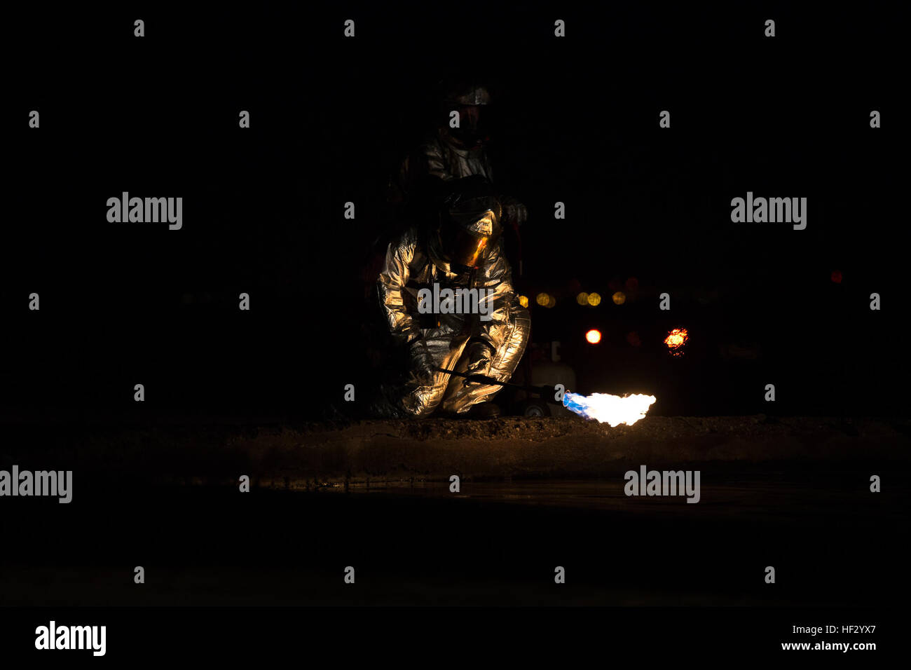 Marines conduct live burn training at MCAS Futenma using blowtorches