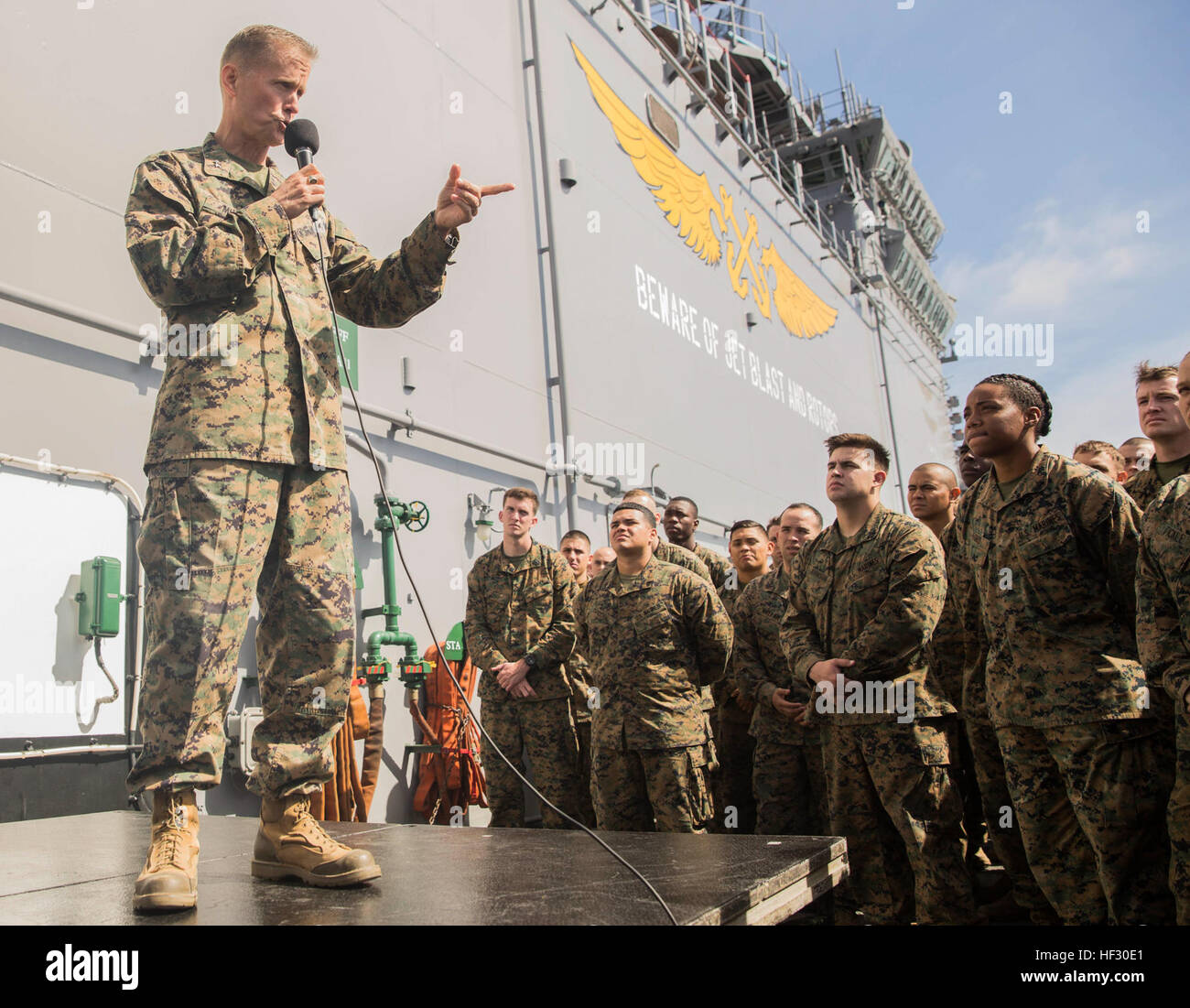 U.S. Marine Maj. Gen. Carl E. Mundy III, left, speaks to Marines and ...
