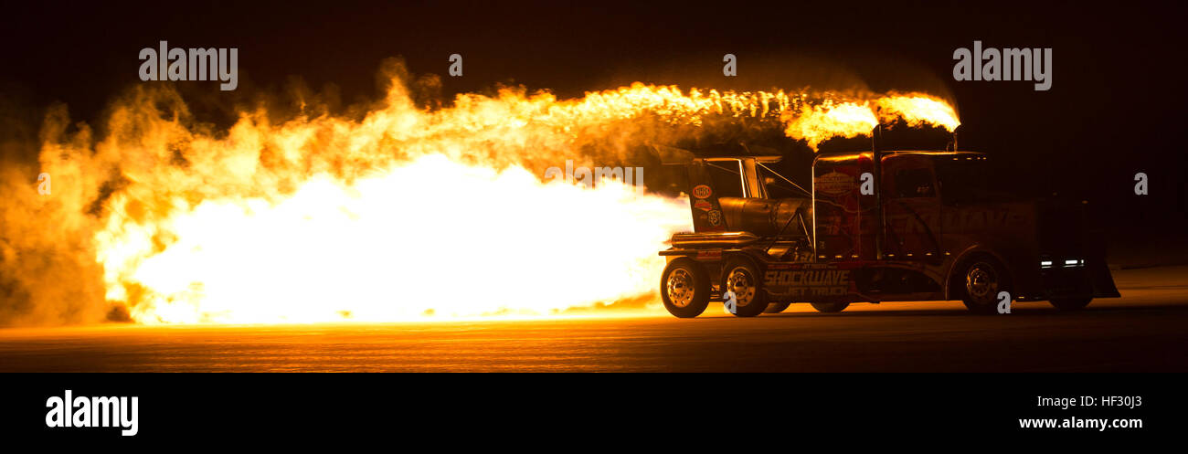 As part of the annual Yuma Airshow, Shockwave Jet Truck driver Chris Darnell delivers a high-octane performance in front of Twilight Show spectators on the flight line at Marine Corps Air Station, Yuma, Ariz., Friday, Feb. 27, 2015. MCAS Yuma Twilight Show 150227-M-UQ043-550 Stock Photo