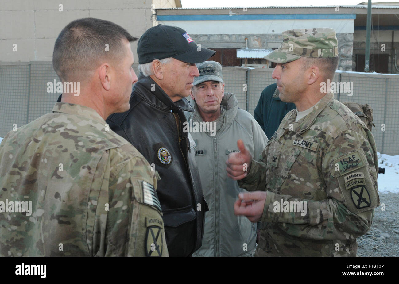 WARDAK PROVINCE, Afghanistan - U.S. Army Col. Bruce P. Antonia (right), Manchester, Conn. native and commander of 4th Brigade Combat Team, 10th Mountain Division's Task Force Patriot based out of Fort Polk, La., talks with U.S. Vice President Joseph Biden (left), while Gen. David Petraeus (middle), commander of International Security Assaistance Force from Cornwall on Hudson, N.Y., and U.S. Army Command Sgt. Maj. Steven Womack (near left), TF Patriot command sergeant major from Leesville, La., listen at Forward Operating Base AIrborne in eastern Afghanistan, Jan. 11. Vice President Biden visit Stock Photo