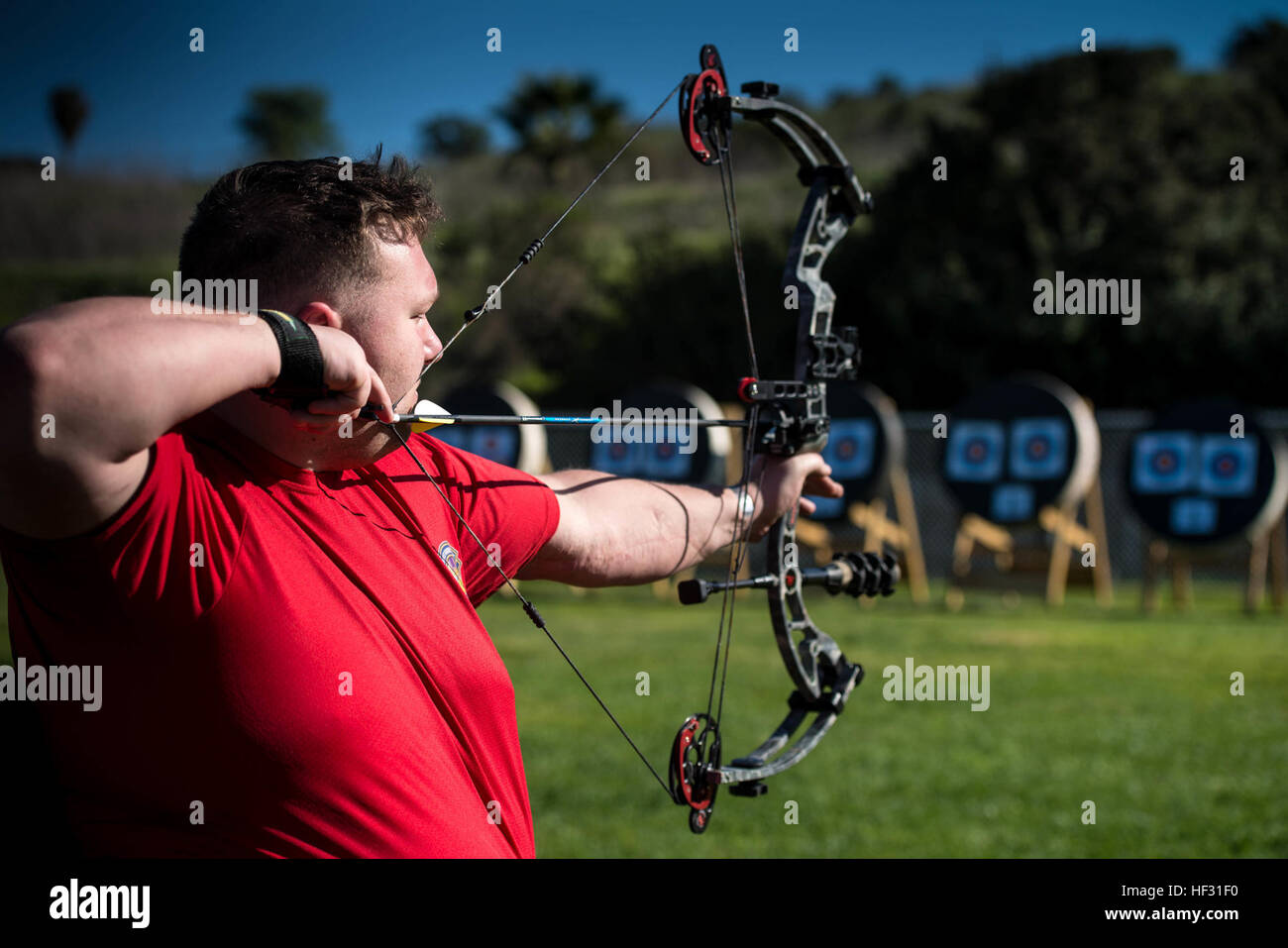 Cpl. Clark Cavalier, a Plaquemine, Louisiana native, draws during