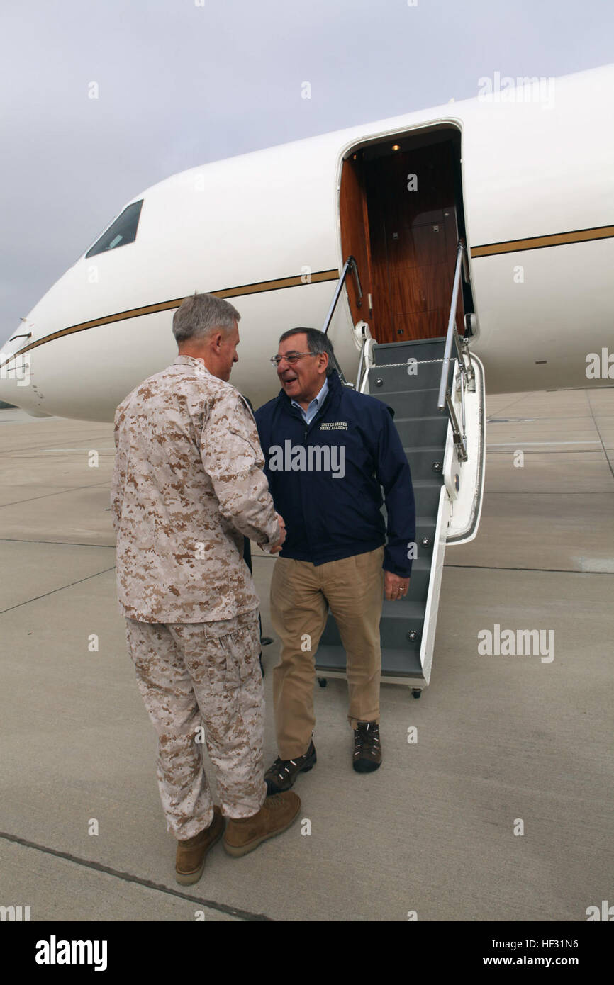 Secretary of Defense Leon Panetta steps off the plane to meet with Lt. Gen. Thomas D. Waldhauser, the I Marine Expeditionary Force commanding general at the Marine Corps Air Station Camp Pendleton, Calif., March 30. Panetta will tour an amphibious assault ship off the coast of Camp Pendleton during his visit. Secretary of Defense visits Camp Pendleton DVIDS551473 Stock Photo