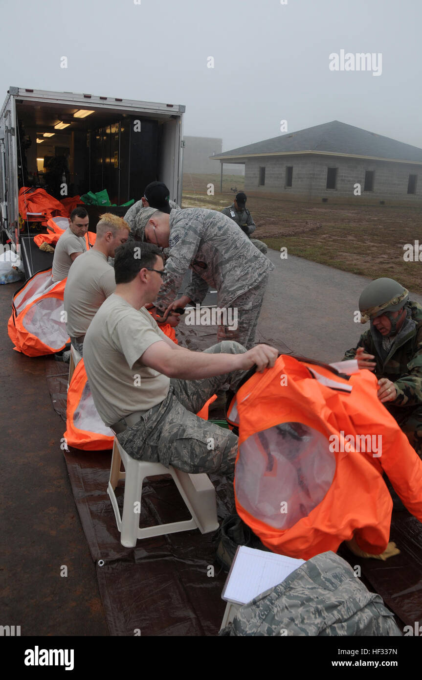 Members of the Air National Guard participate in various activities during the Global Dragon exercise at the Guardian Center, Perry, Ga., March 14, 2015. The emergency management mission is to safely respond via training by entering hazardous environments to detect, monitor and sample for CBRN and other hazardous materials. (U.S. Air National Guard photo by Senior Airman Cody Martin/released) Global Dragon deployment for training 150314-Z-LK614-024 Stock Photo