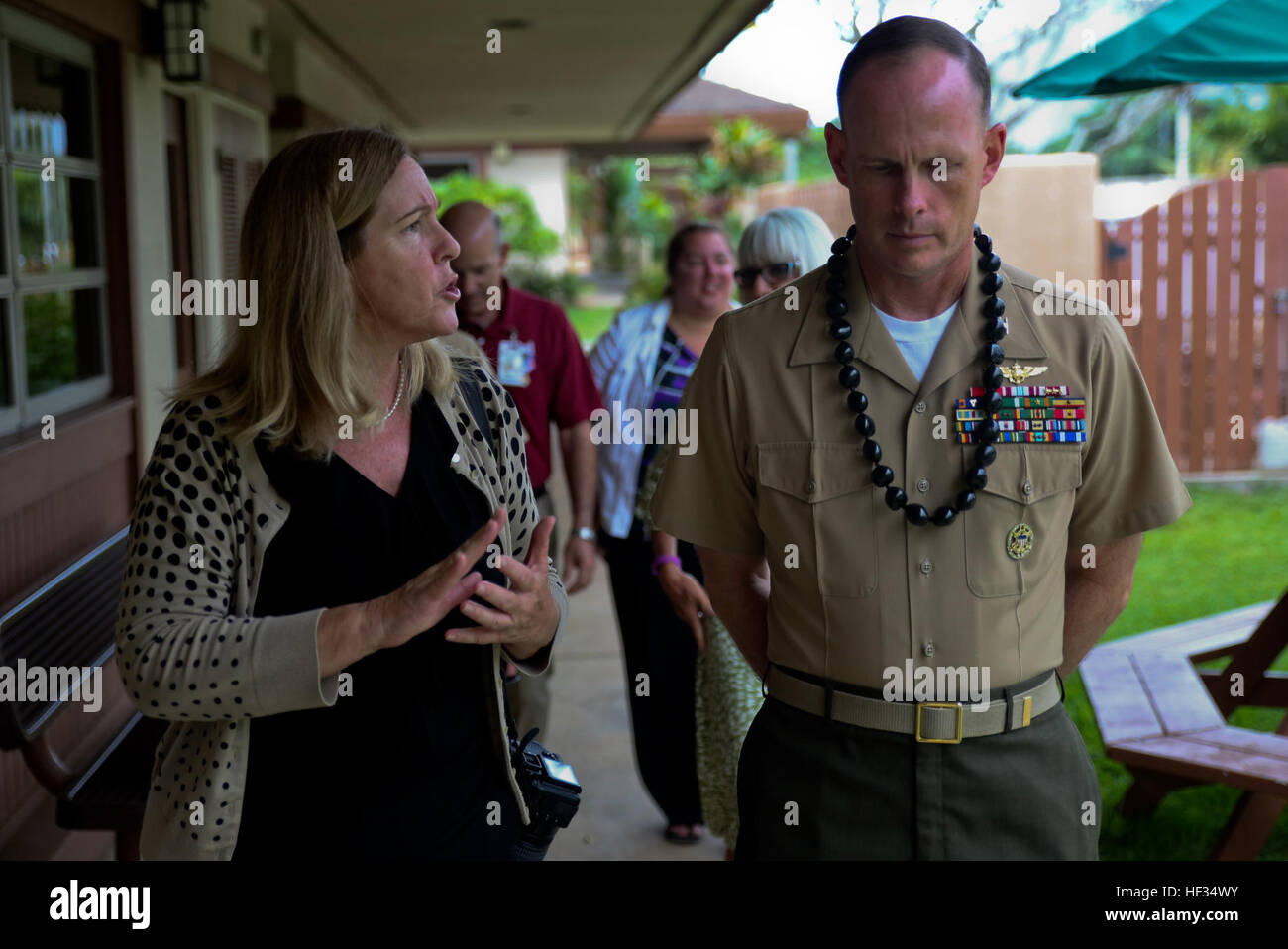 Julie Dugan, the business community outreach manager with the Hawaii Job Corps Center, provides a tour to Col. Eric W. Schaefer, the commanding officer for Marine Corps Base Hawaii, along with other Job Corps staff and base representatives March 24, 2015, at the Job Corps Center in Waimanalo. Since 1964, the Job Corps has been committed to offering students a safe, drug-free learning and training environment. (U.S. Marine Corps photo by Lance Cpl. Harley Thomas/released) Hawaii Job Corps pushes students toward summit 150324-M-SB674-803 Stock Photo