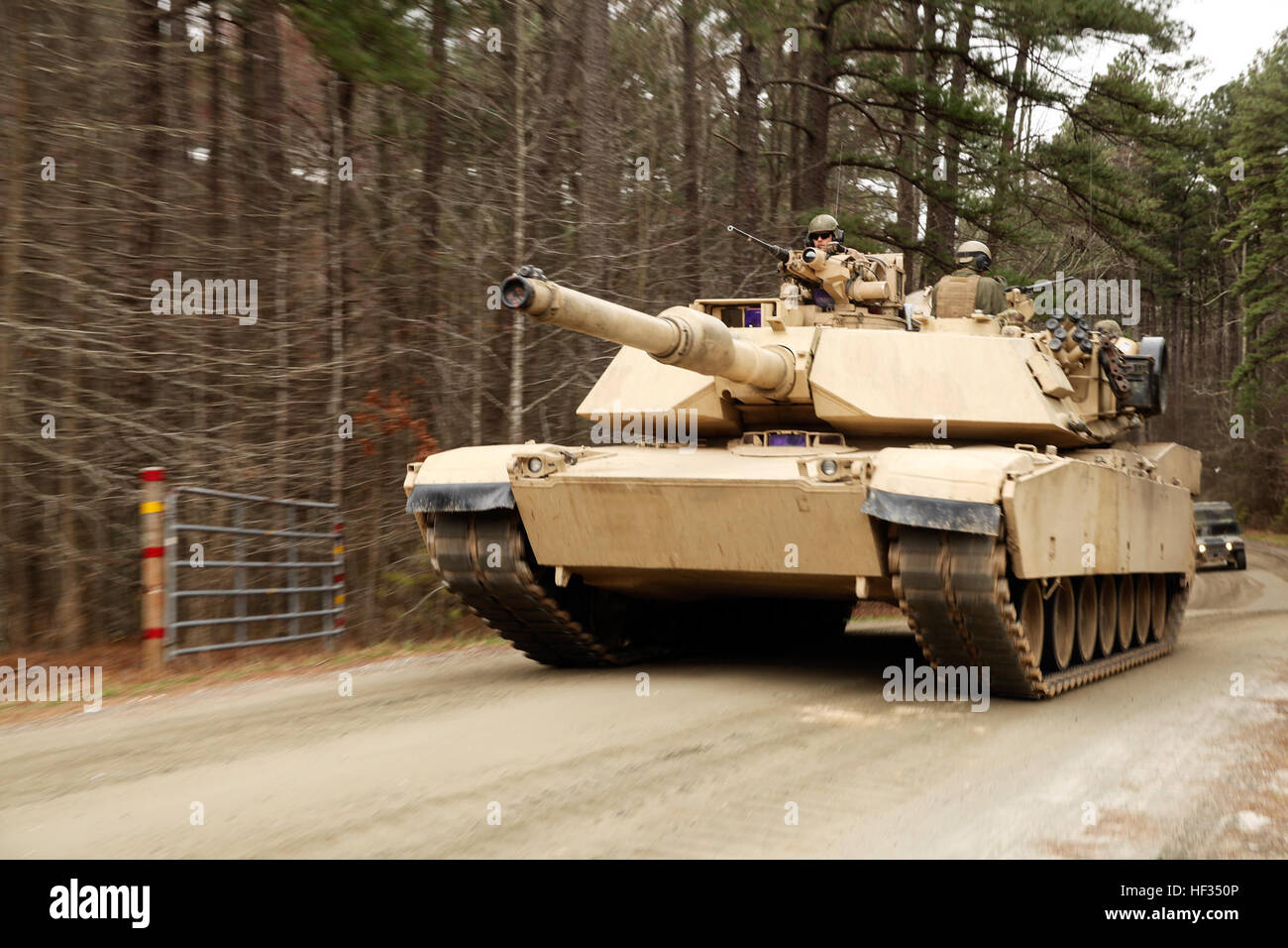 An M1A1 Abrams tank with 2nd Tank Battalion, 2nd Marine Division drives