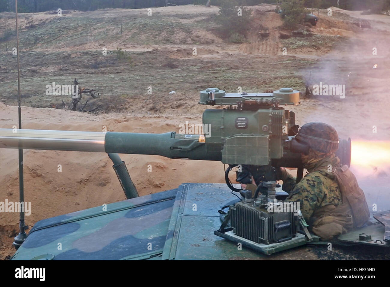 A Marine with Weapons Company, Black Sea Rotational Force 15, fires a