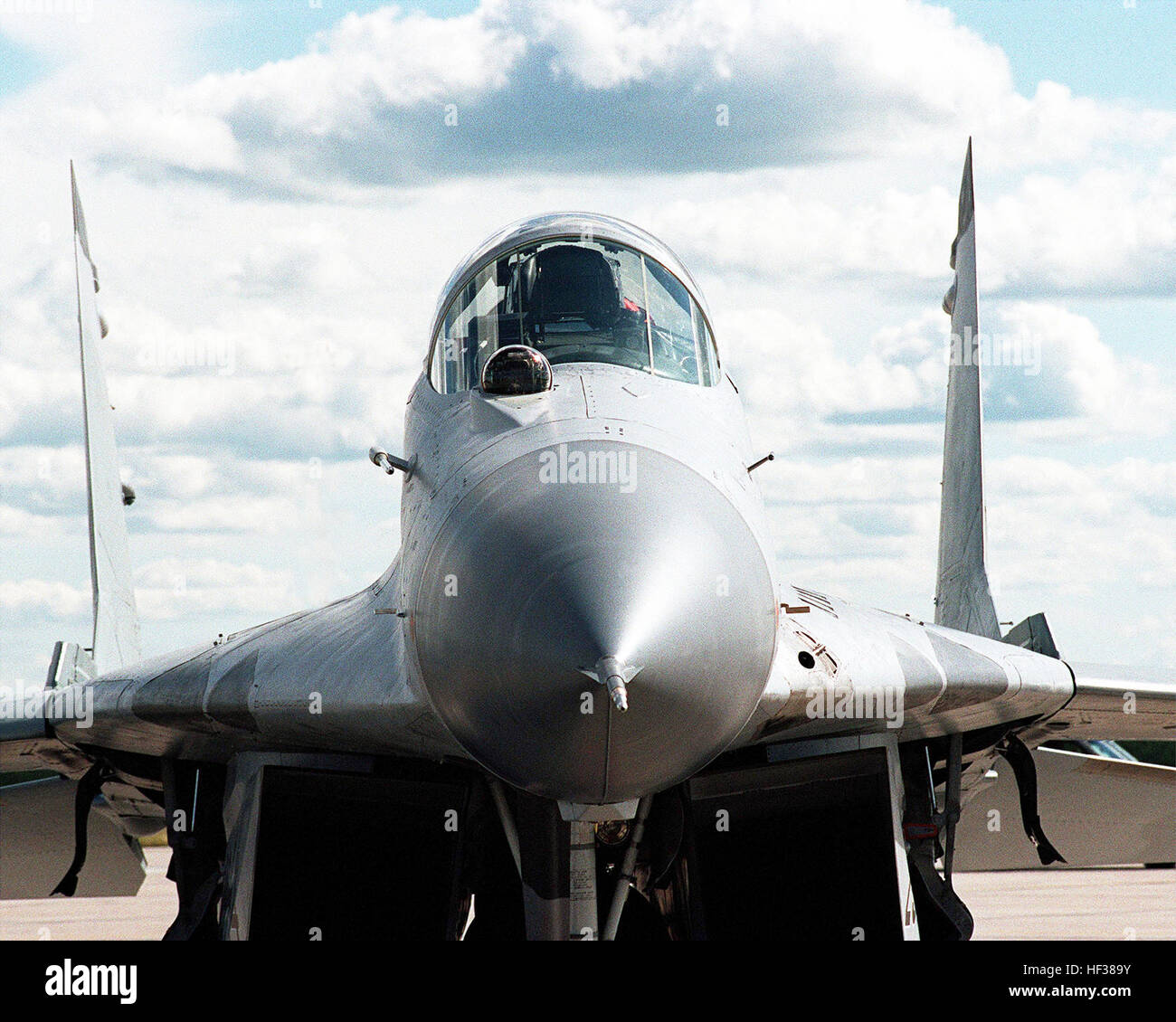 During Operation MAPLE FLAG, held in Cold Lake Canada, a German MIG-29 stands on the flight line.  The German Air Force took part in the NATO joint opertion with an Electronic Warfare Squadron Marine Attack Squadron 4 (VMA-Q4)  EA6-B Prowler aircraft from Marine Corps Air Station Cherry Point, North Carolina. German MIG-29 Nose Stock Photo