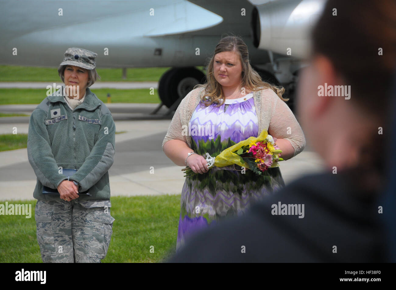 Lt. Col. Christine Blice-Baum, a chaplain with the 375th Air Mobility Wing, and Bobbi Jo Cyr attend an outdoor memorial service at Scott Air Force Base, Ill., in honor of Cyr's brother, Capt. Brandon Cyr. on the second anniversary of his death, April 27, 2015. The 906th Air Refueling Squadron held a memorial service for Capt. Brandon Cyr who died in a plane crash in Afghanistan. (Air National Guard photo by Master Sgt. Ken Stephens) Memorial Walk in honor of Capt. Brandon Cyr 150427-Z-TL822-006 Stock Photo