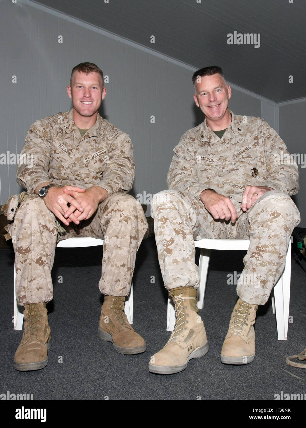 Col. Rick Nelson, right, the Chief of Staff for Iraq-based Multi-National Force West, had a chance to meet with his son, 1st Lt. Andrew Nelson, during a visit to the 22nd Marine Expeditionary Unit. 1st. Lt. Nelson is the platoon commander for Engineer Platoon, Headquarters and Support Company, Battalion Landing Team, 3rd Battalion, 2nd Marine Regiment, 22nd MEU. 1st. Lt. Nelson  is a native of Camp Lejeune, N.C. The MEU is aboard Camp Buehring, Kuwait, conducting sustainment training. The 22nd MEU is serving as the theater reserve force for U.S. Central Command. Chief of Staff's family reunion Stock Photo